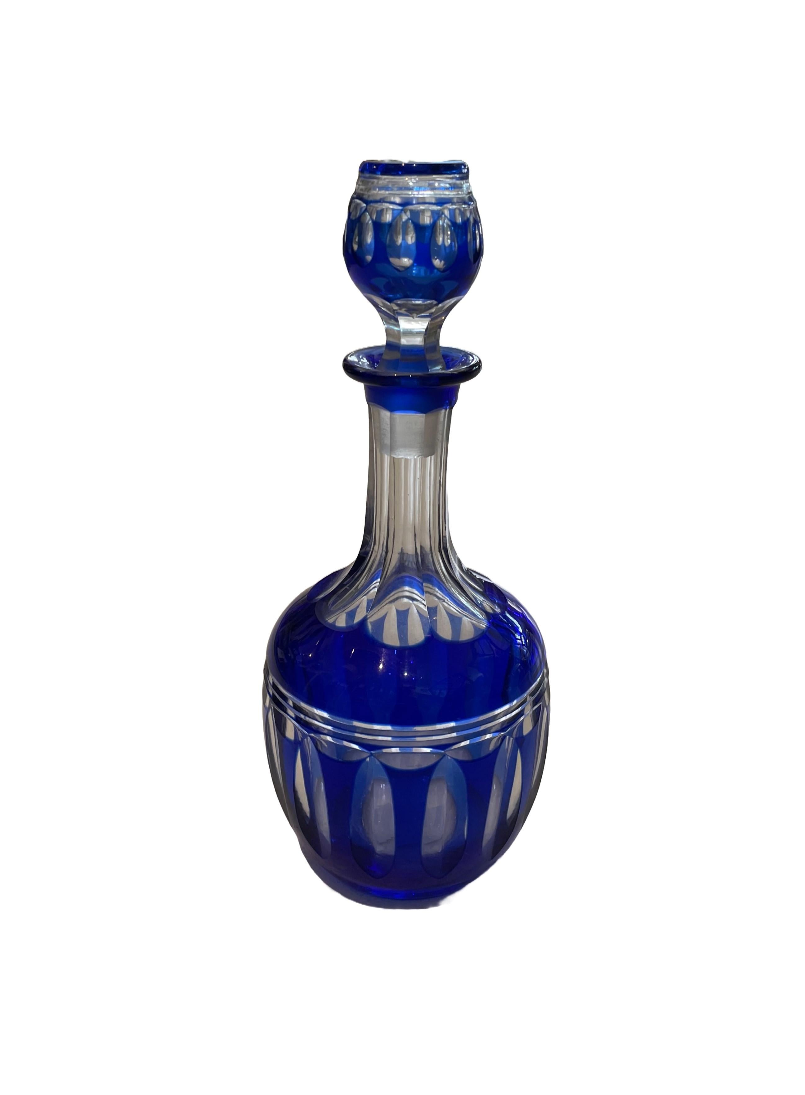 This gorgeous Cobalt Blue Cut to Clear Glass decanter with ground glass stopper is a quality addition to any collection, a fabulous gift item or utilitarian and decorative beverage decanter. 
