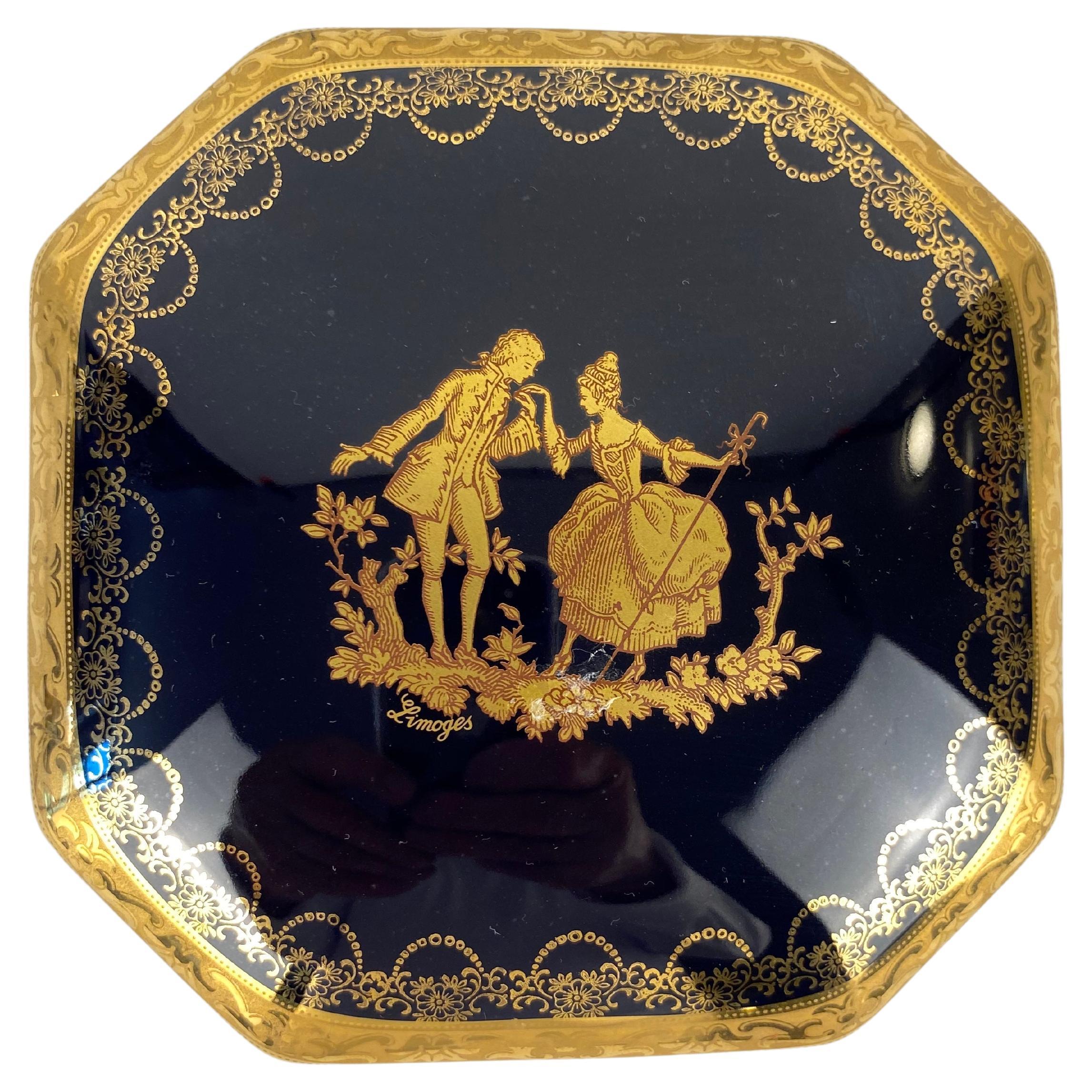 A fine cobalt blue and gold Limoges porcelain hand crafted and hand painted gold trimmed trinket, jewelry box or candy dish. 

Bears the well-known Limoges mark.

Measures: 4 7/8