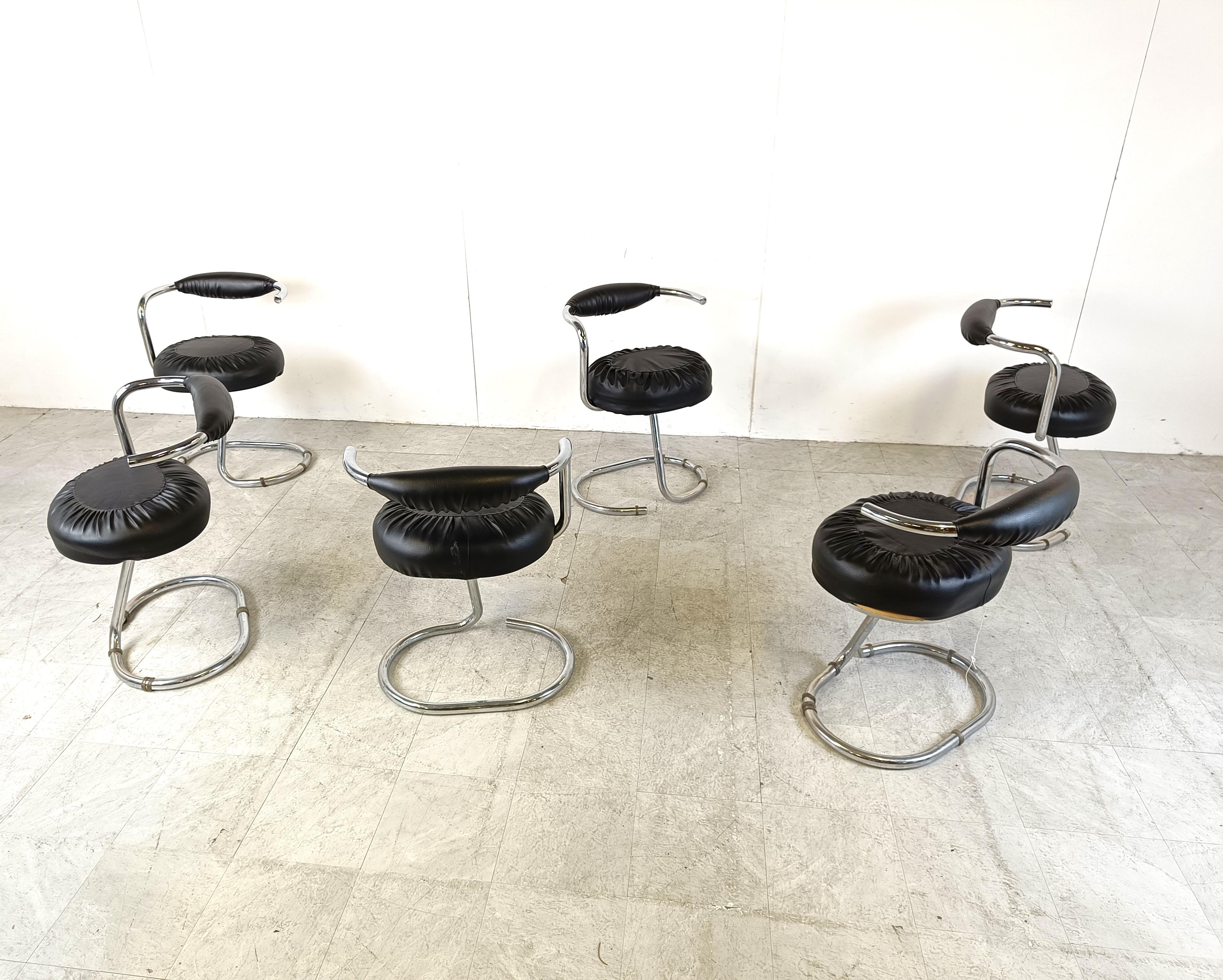 Set of 6 'cobra' chairs designed by Italian designer Giotto Stoppino.

Comes with a black leatherette upholstery.

Good condition

1970s - Italy

Measurements
Width	58 cm/22.8