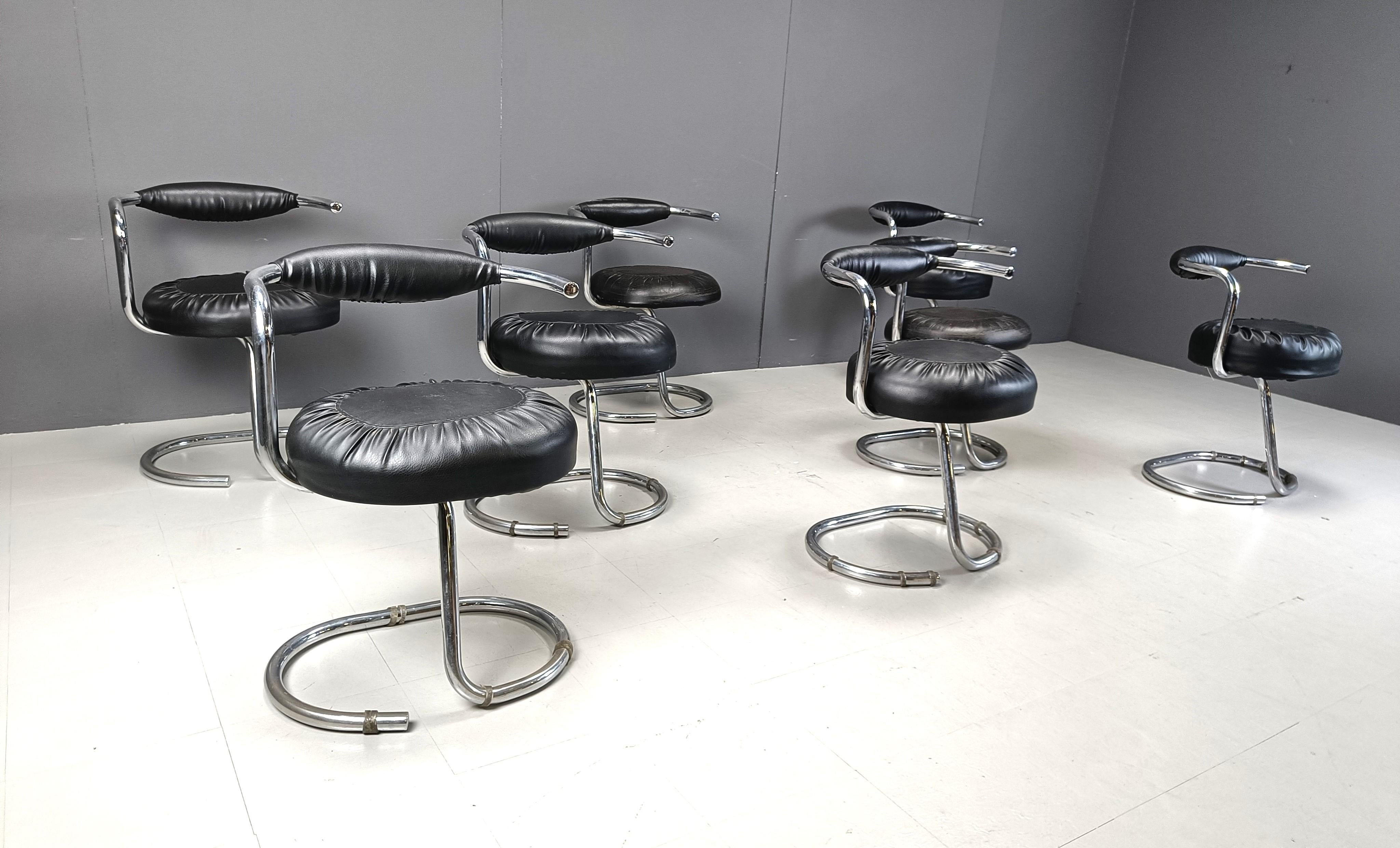 Set of 8 'cobra' chairs designed by Italian designer Giotto Stoppino.

Comes with a black leatherette upholstery.

Good condition

1970s - Italy

Measurements
Width	58 cm/22.8