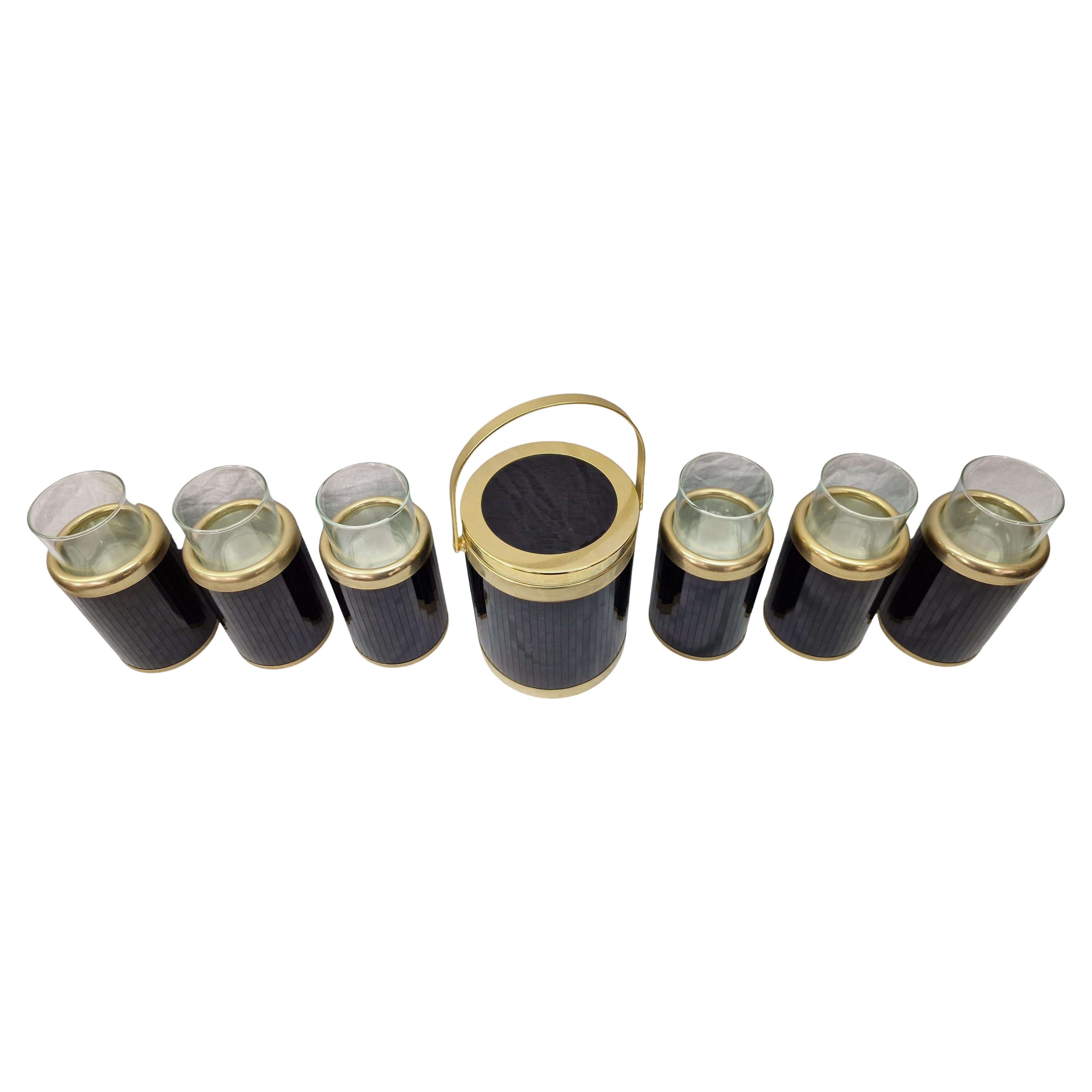 Exquisite cocktail bar set by the famous Italian Design Company Lidian, model name Glacette, made in the 1970s. 

Crafted from plated plastic with a distinctive rod-like texture, this set reflects the quintessential design elements of the 1970s. The