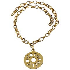 Vintage COCO CHANEL Cutout Openwork Logo Medallion Inès de la Fressange Necklace