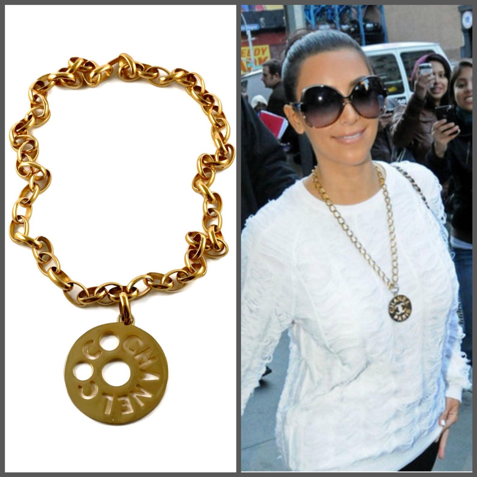 Vintage COCO CHANEL Cutout Openwork Logo Medallion Kim Kardashian Necklace

Measurements:
Height: 2 3/8 inches (6.03 cm) excluding the bail
Width: 2 3/8 inches (6.03 cm)
Chain: 31 4/8 cm (80.01 cm)

As seen on Kim Kardashian wearing similar necklace