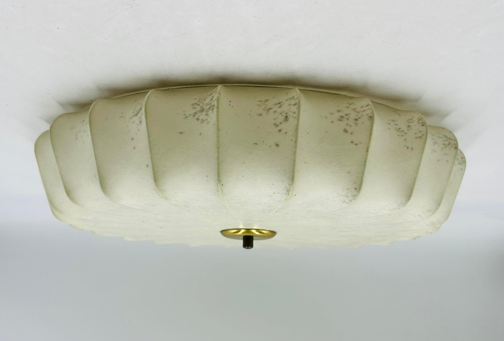 Vintage Cocoon flush mount ceiling light marked FW Gepruft.

 The piece has four lights inside which provide ample illumination.

 Marked.

 Measurements:
18 inches in diameter x 5 inches high.