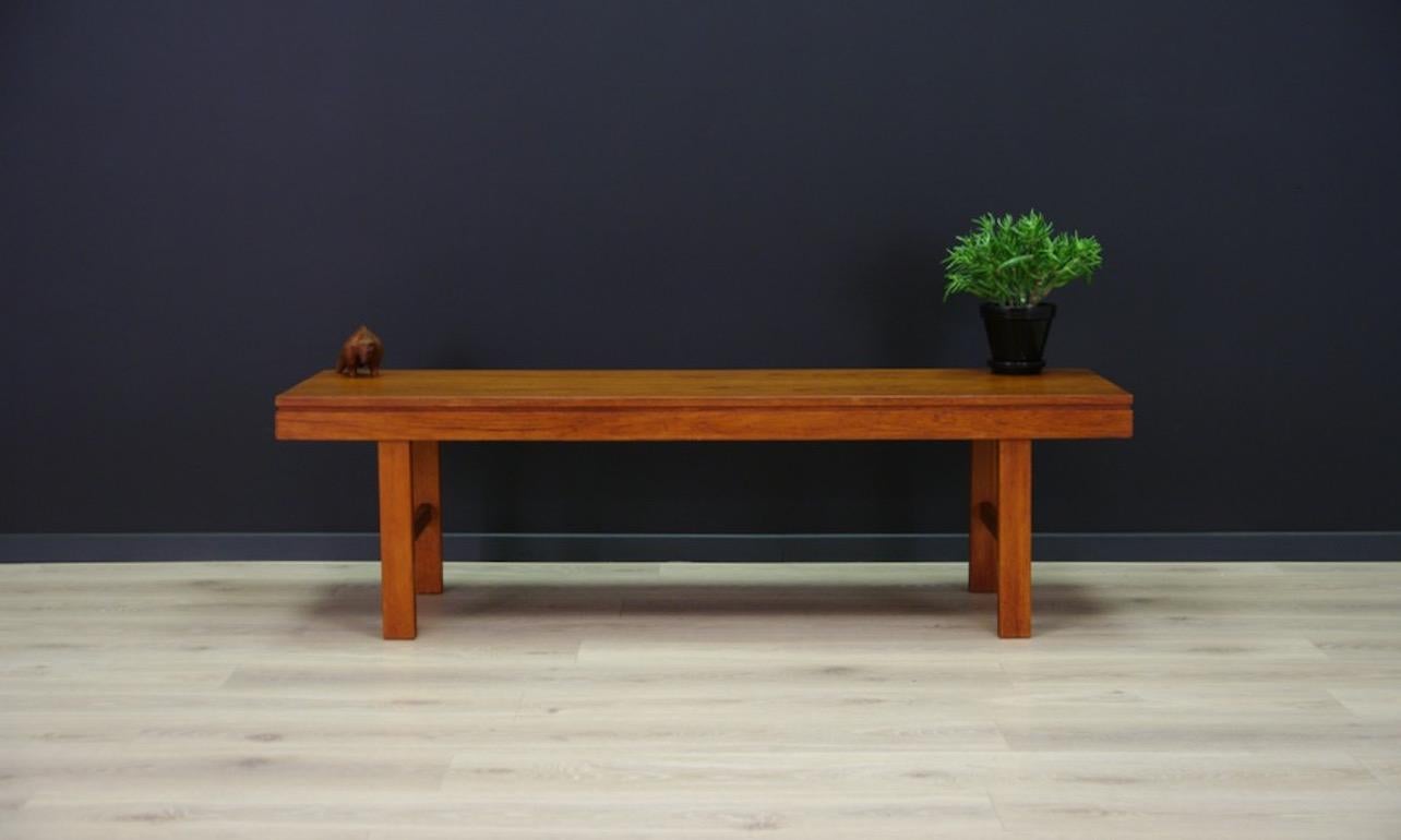 Stylish coffee table from the 1960s-1970s, Danish design, covered with teak veneer. Preserved in good condition (minor scratches, darker spots on the countertop) - directly for use.

Dimensions: Height 44.5 cm, tabletop 150 cm x 50 cm.