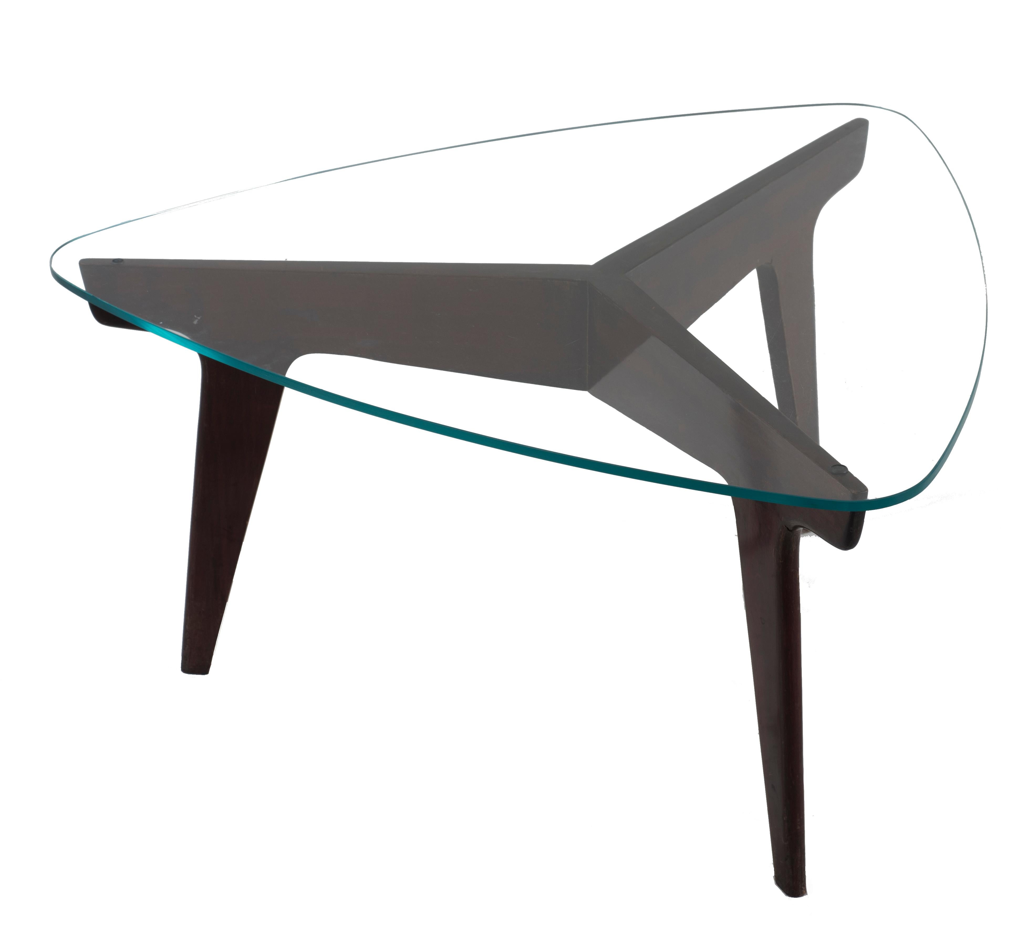 Der Couchtisch ist ein originales Designmöbel von Gio Ponti aus den 1950er Jahren.

Mahagoniholz und Kristallplatte. Sehr guter Zustand.

