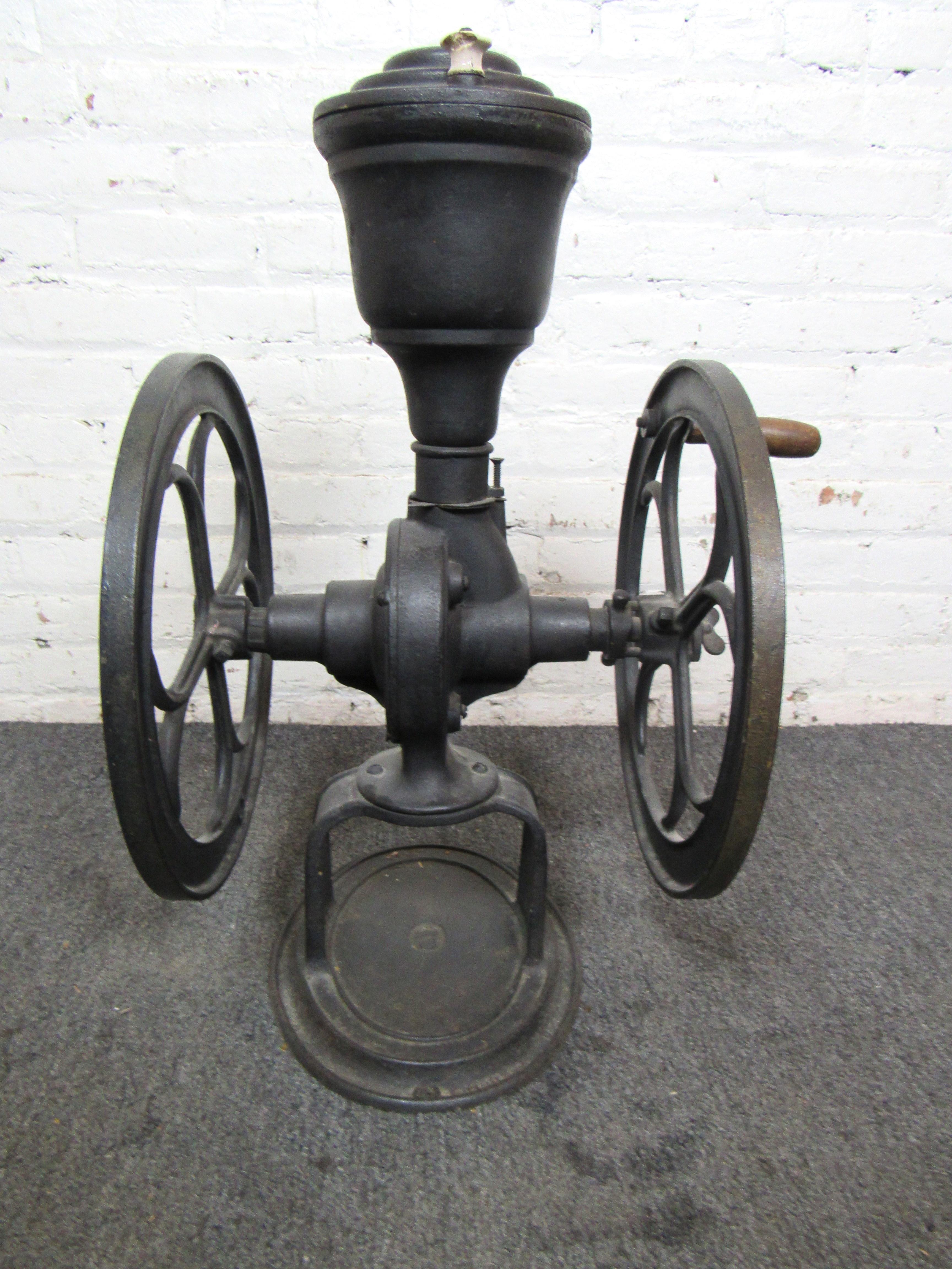 Large iron grinder for coffee stamped with Coles Mfg Co from Philadelphia PA. Makes a great statement piece in a large kitchen or coffee shop.
Please confirm location NY or NJ.