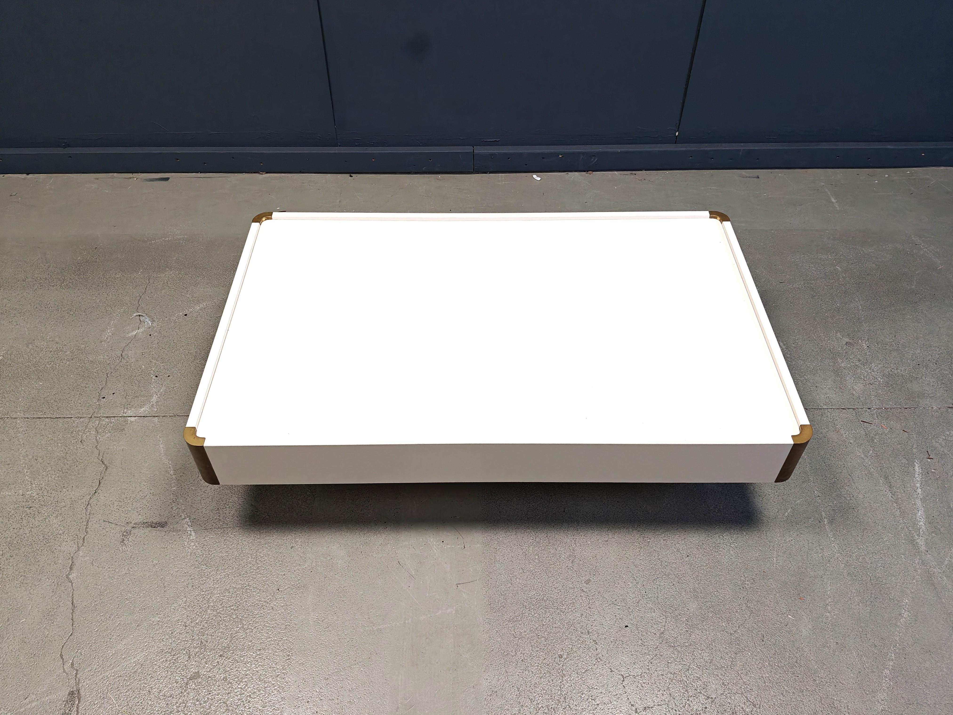 Vintage lacquered wood coffee table with brass corners by Willy Rizzo for Mario Sabot.

Timeless design 

Good condition with a nice patina on the brass.

1970s - Italy

Dimensions:

Height: 35cm
Width: 130cm
Depth: 80cm

Ref.: 25111007

*All images