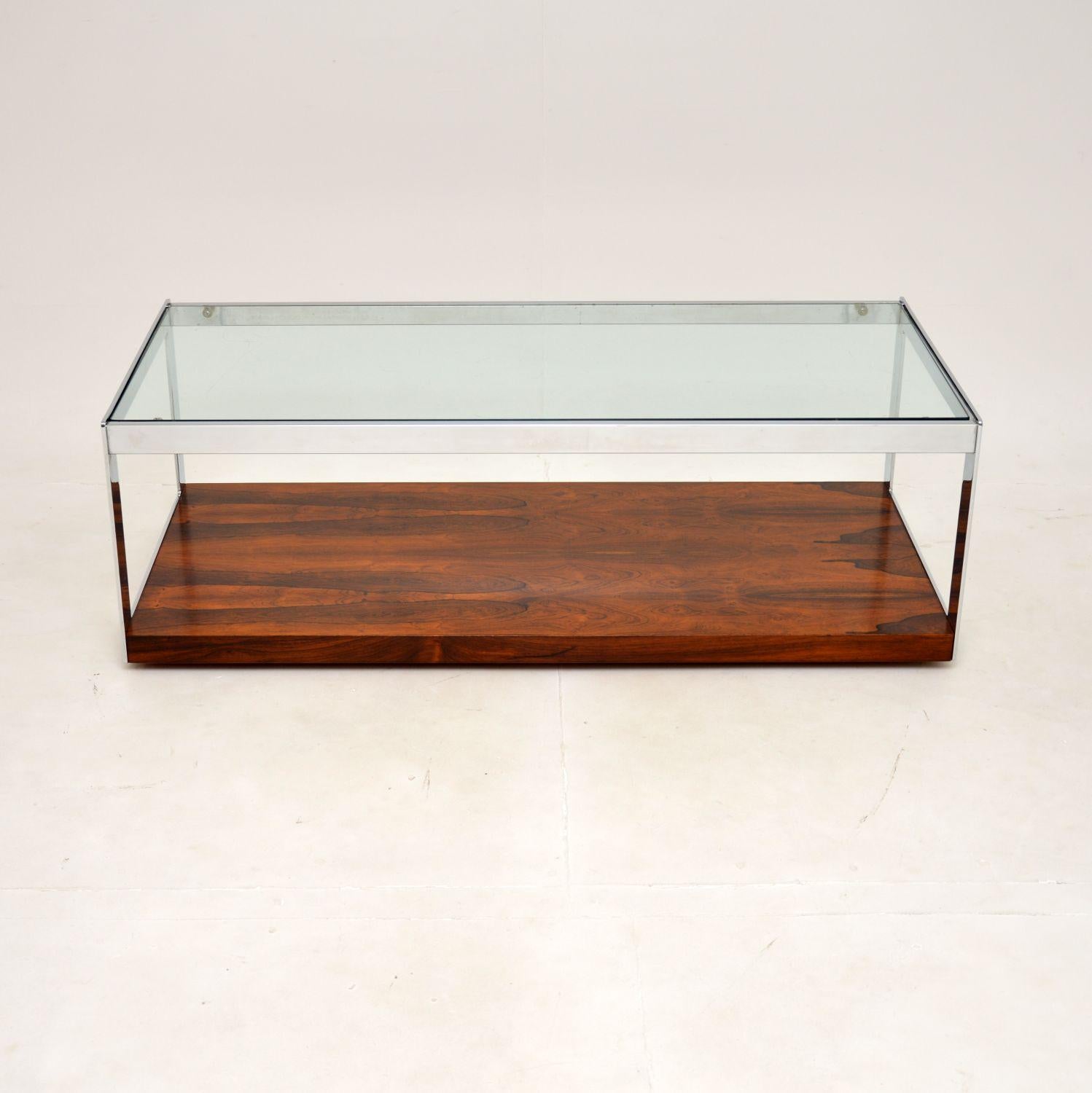 A very stylish and iconic vintage coffee table by Merrow Associates. This was made in England, it was designed by Richard Young and it dates from the early 1970’s.

The quality is superb, this is a great size with a useful lower tier for storage.
