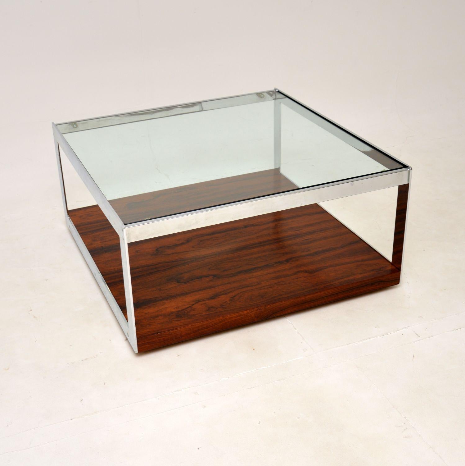 A very stylish and iconic vintage coffee table by Merrow Associates. This was made in England, it was designed by Richard Young and it dates from the early 1970’s.

The quality is superb, this is a great size with a useful lower tier for storage.