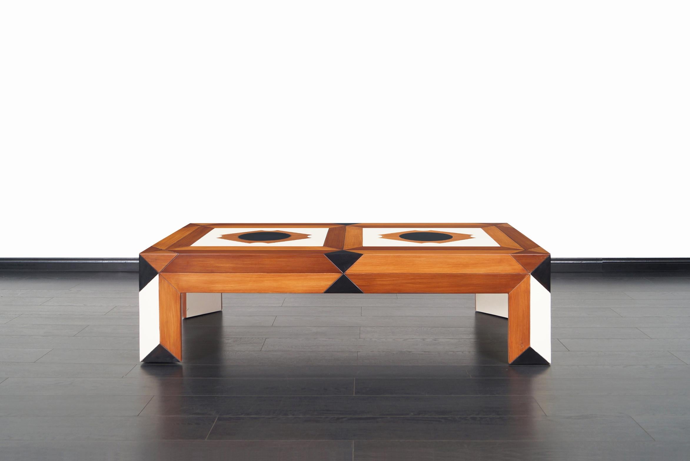 Vintage coffee table created by Beverly Hills designer, Phyllis Morris. Features a different and luxurious style to make this table a functional piece of art. Ideal for any interior, this table will become the center of attention in your gatherings