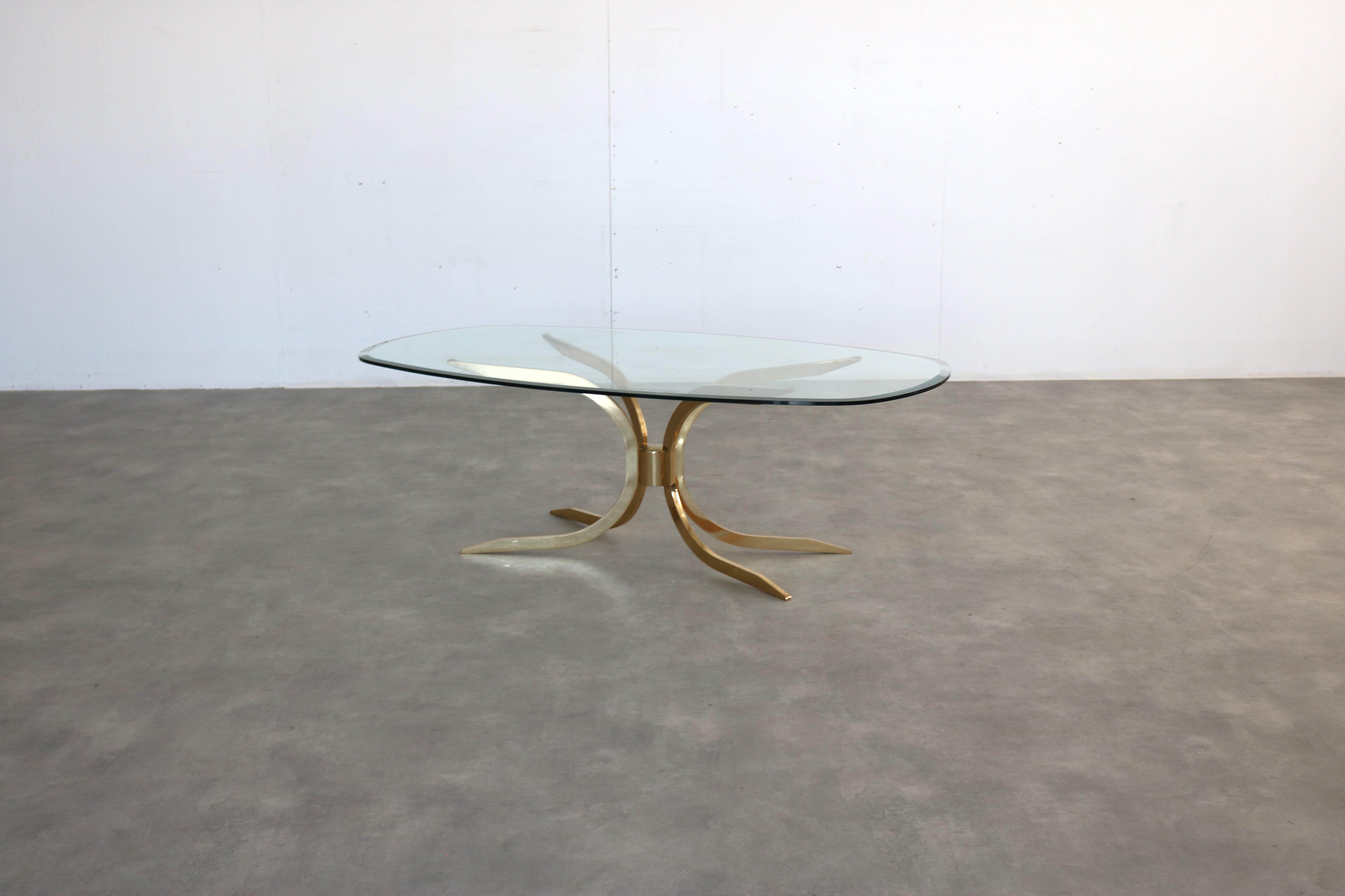 vintage coffee table  hollywood regency  1960s  swedish

period  1960s
design  unknown  sweden
condition  good  minor signs of use  chip on the side
size  46.5 x 140 x 79.5 (hxbxd)

details  brass; glass;

item number  2834