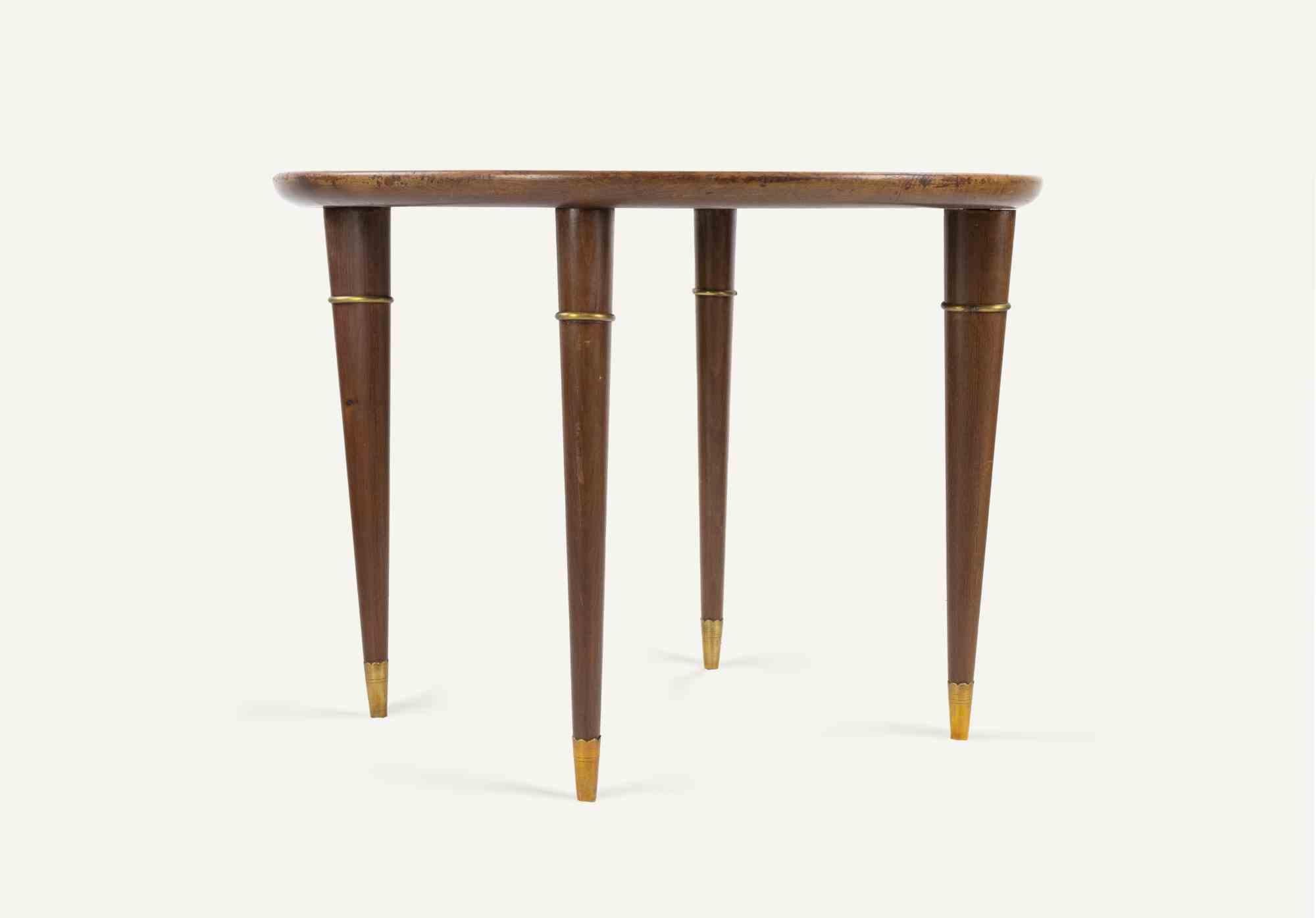 Vintage Couchtisch im Stil von Paolo Buffa, realisiert in den 1950er Jahren.

Kirschenholz, Messing und Glas.

Guter Zustand.