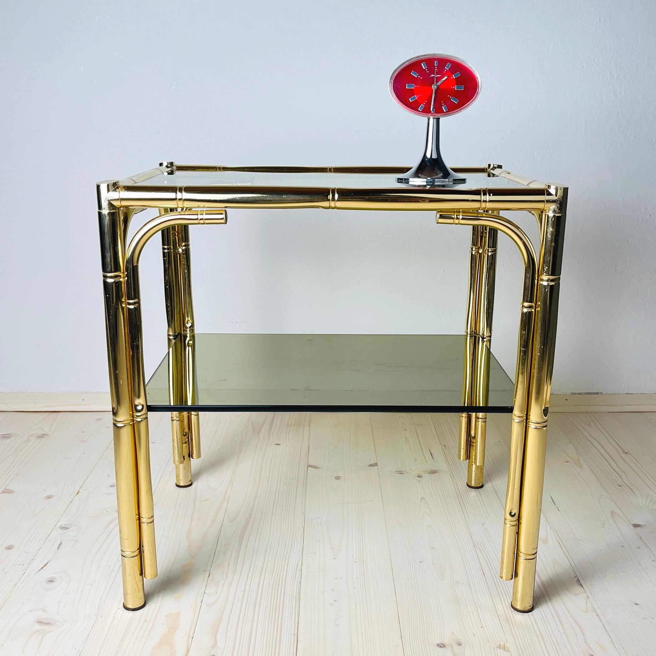 Experience the allure of the 70s with this remarkable Italian metal side table, exquisitely designed to resemble bamboo. Offering both aesthetics and practicality, this table is a versatile addition to your space.

With its comfortable height and
