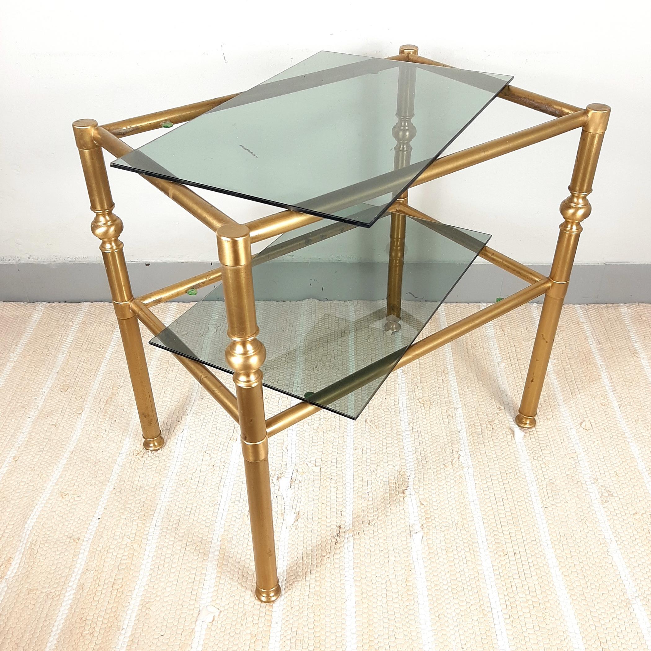 Elevate your living space with this exquisite brass side table, a true embodiment of 1970s Italian design. Crafted in Italy, this piece not only exudes a sense of timeless elegance but also offers versatile functionality.

The design is both