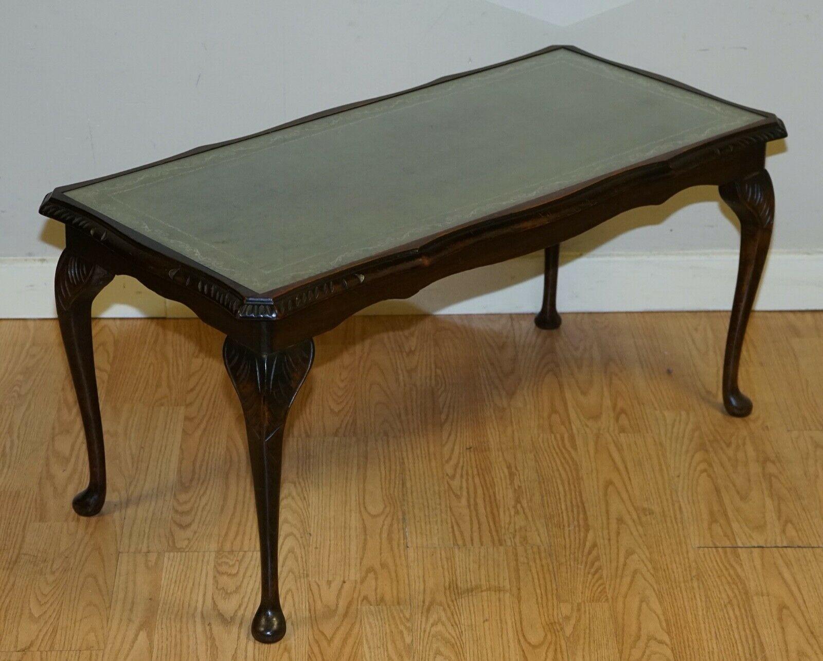 We are delighted to sell this Very Elegant Vintage Green Leather top Coffee Table.
The top part of the wood is quite faded but gives it a vintage look, the rest of the coffee table is in a good condition.
We have lightly restored this by giving it