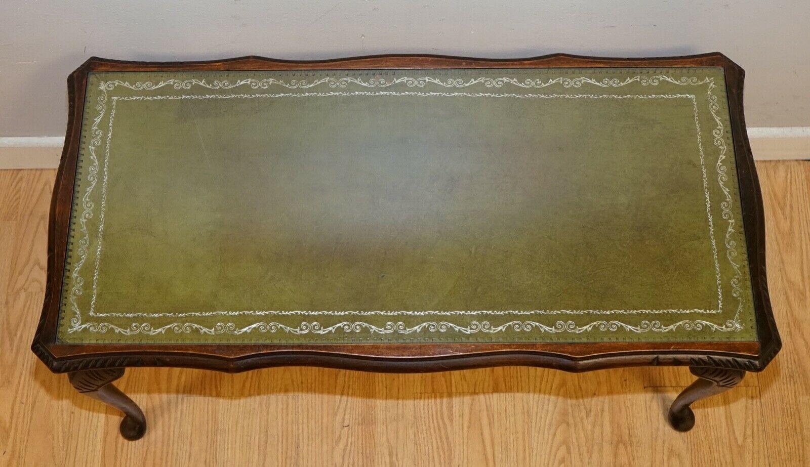 British Vintage Coffee Table with Embossed Green Leather Top on Elegant Queen Anne Legs
