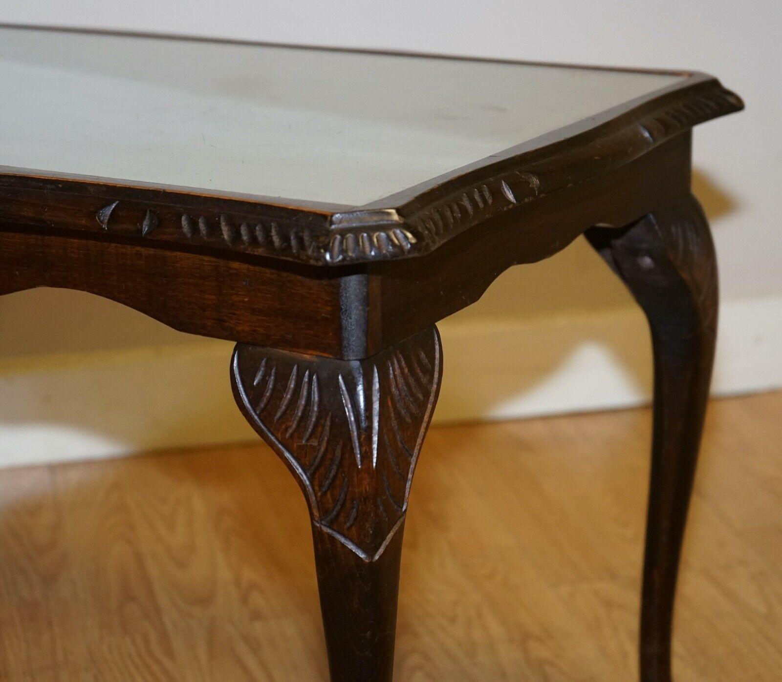 Hand-Crafted Vintage Coffee Table with Embossed Green Leather Top on Elegant Queen Anne Legs