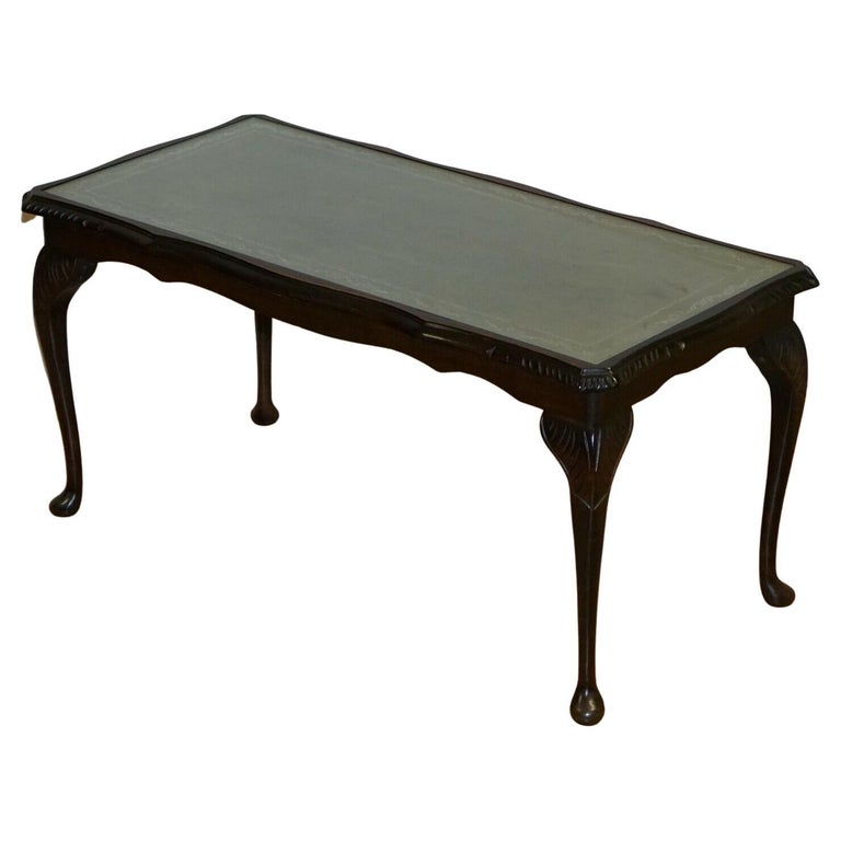 Vintage Coffee Table with Embossed Green Leather Top on Elegant Queen