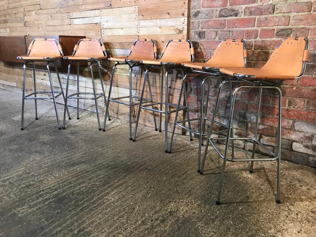 Mid-Century Modern Vintage cognac colour Leather Stools Selected by Charlotte Perriand for Les Arcs For Sale