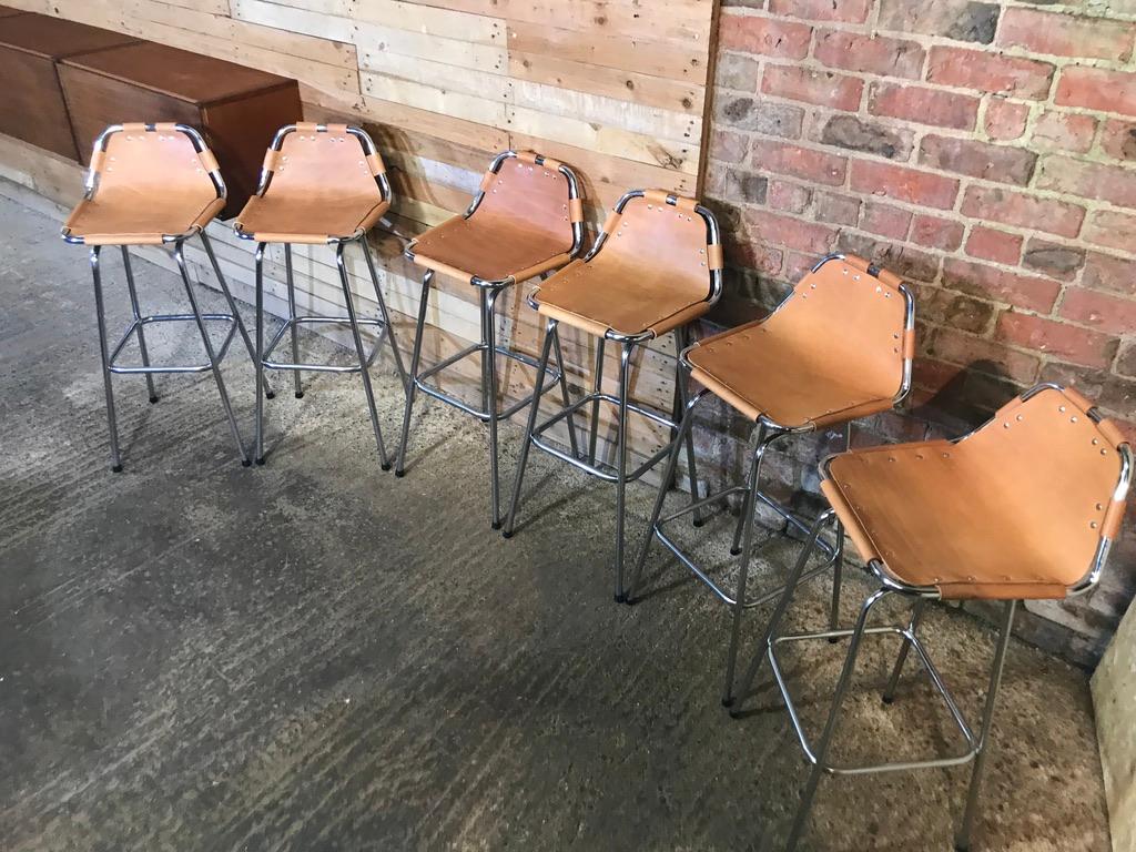 French Vintage cognac colour Leather Stools Selected by Charlotte Perriand for Les Arcs For Sale