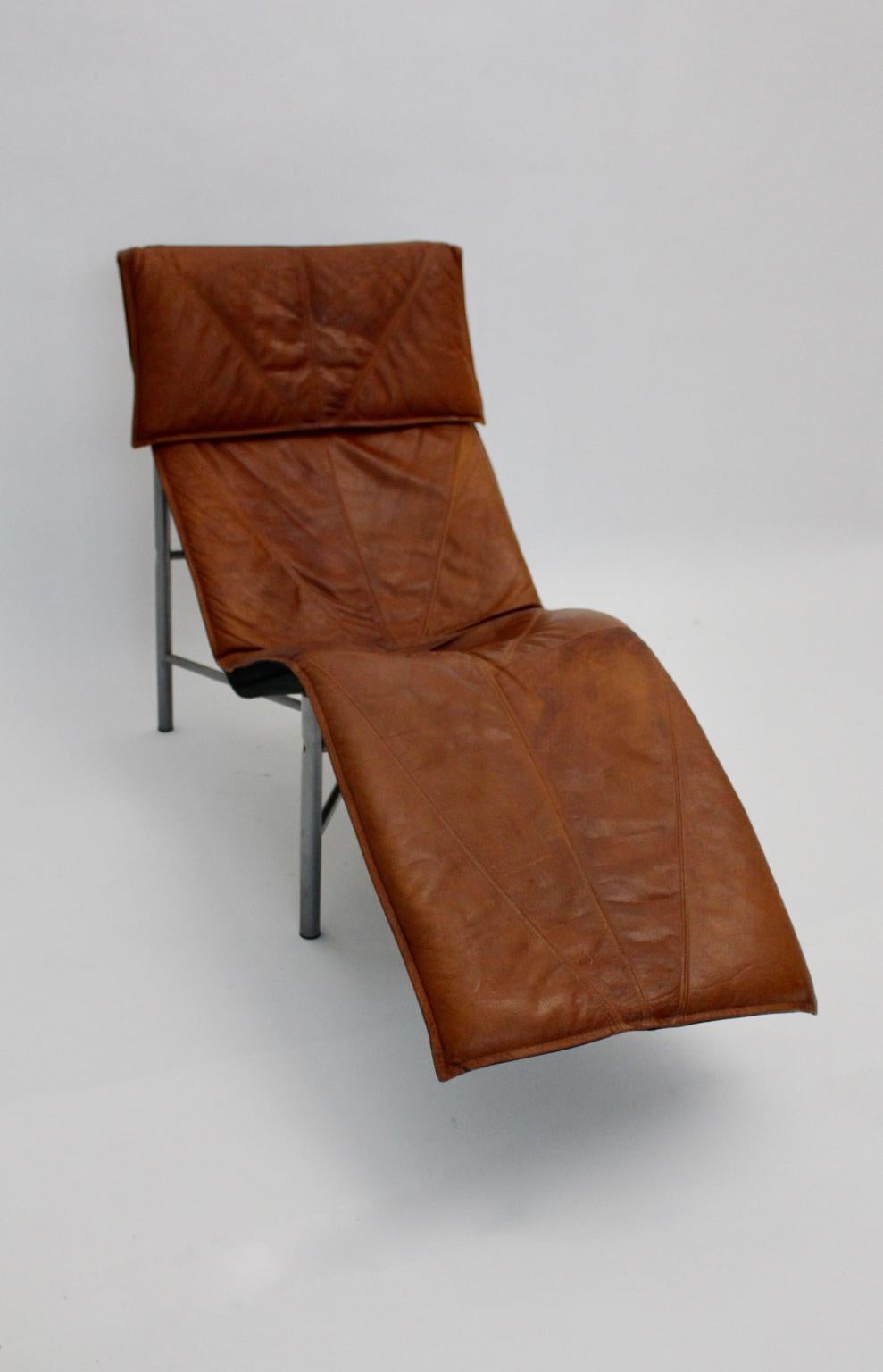 Metal Vintage Cognac Leather Chaise Longue by Tord Bjorklund Sweden, 1970 For Sale