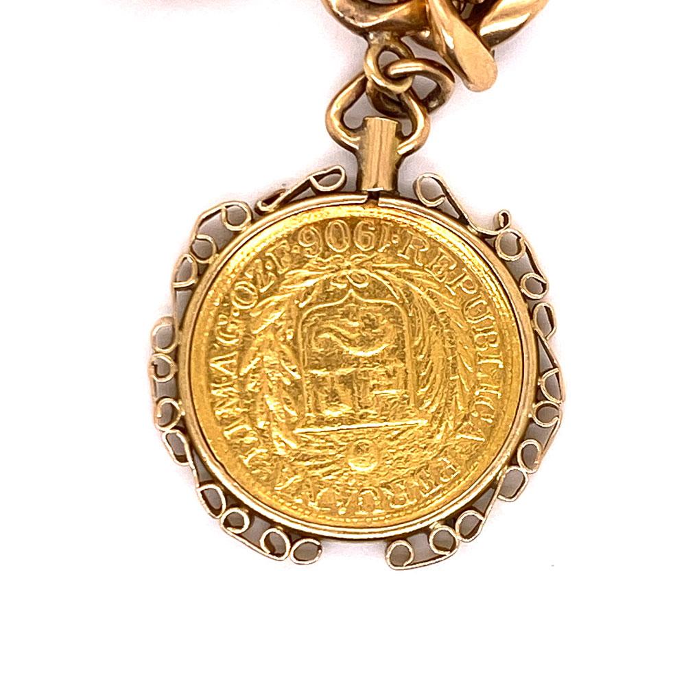 Charm bracelet featuring 4 European coins ( 22k gold tested). The coins are in 18 karat yellow gold decorative charms and charm bracelet. The bracelet measures 7.5 inches in length, and measures 8mm in width. 