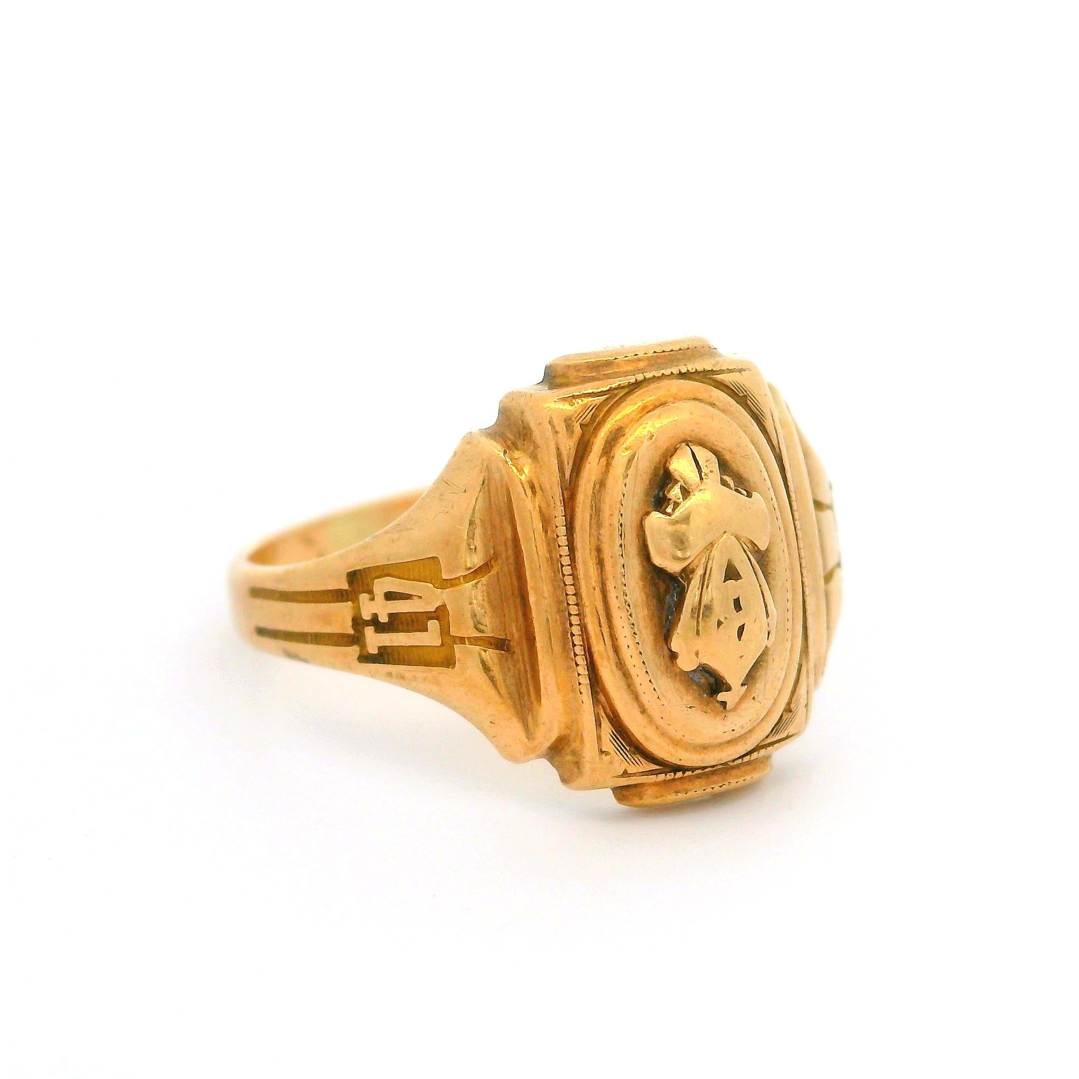 Material: 10k Yellow Gold
Weight: 4.12 Grams
Ring Size: 7.0 ( fitted on finger, please contact us prior to purchase with sizing inquiries)
Ring Width: 13.48mm (0.53