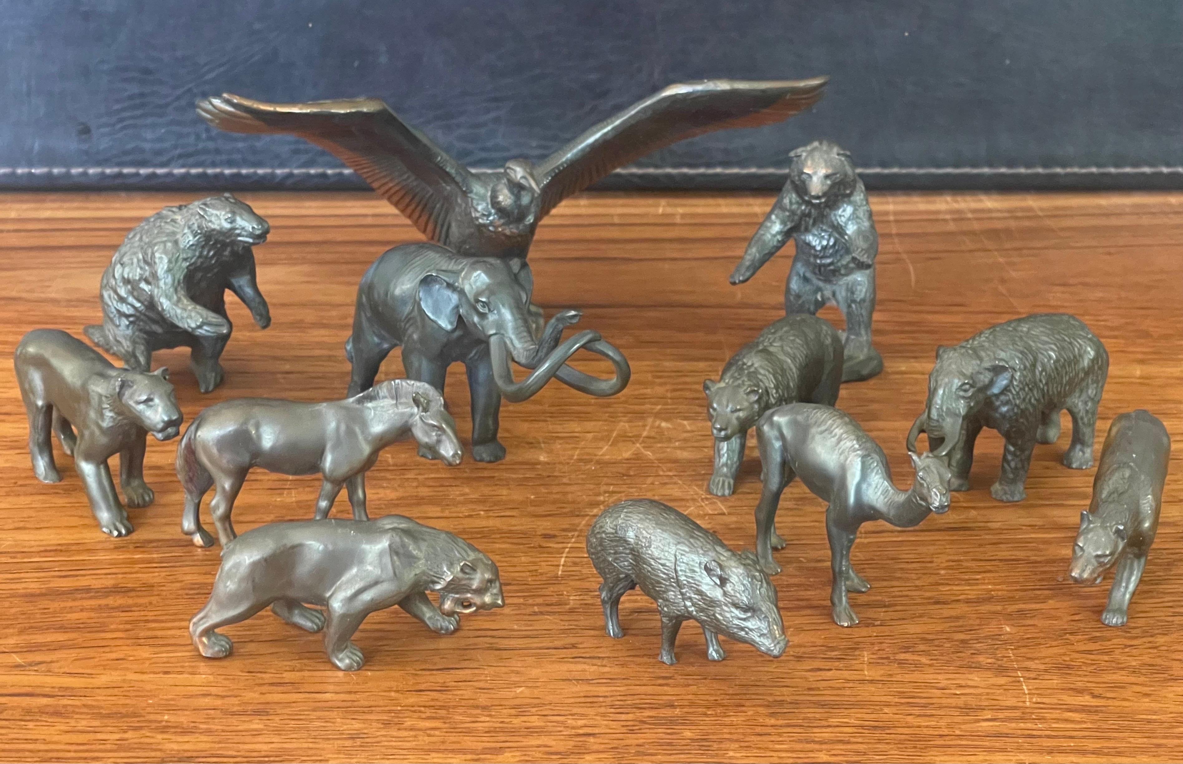 A very rare collection of twelve miniature bronze ice age mammal sculptures that were created by Wm Otto for the Rancho La Brea Tar Pits museum and gift shop circa, late 1950s. The sculptures were designed based on restorations from skeletons