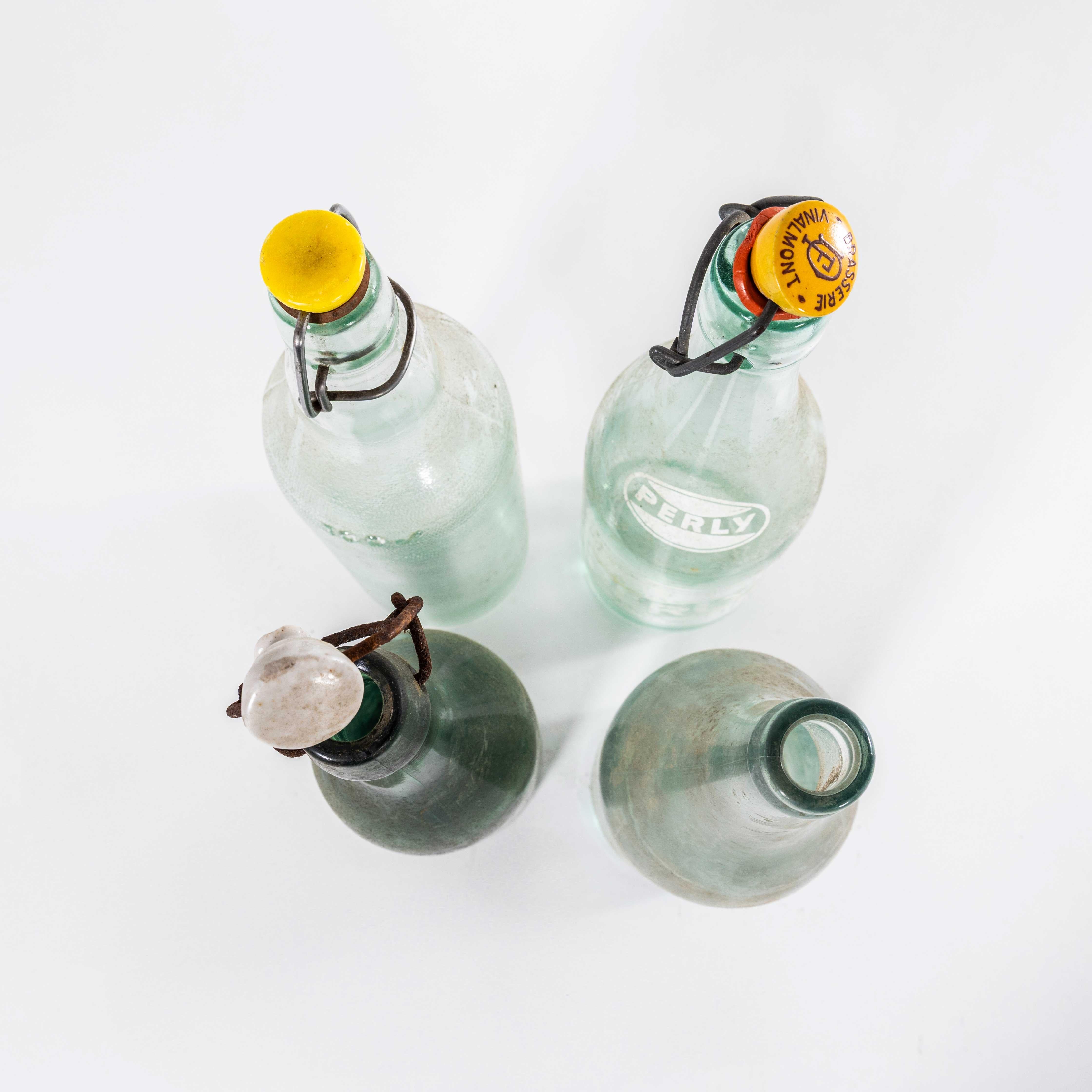Glass Vintage Collection Of French Soda Bottles Set Of Four For Sale