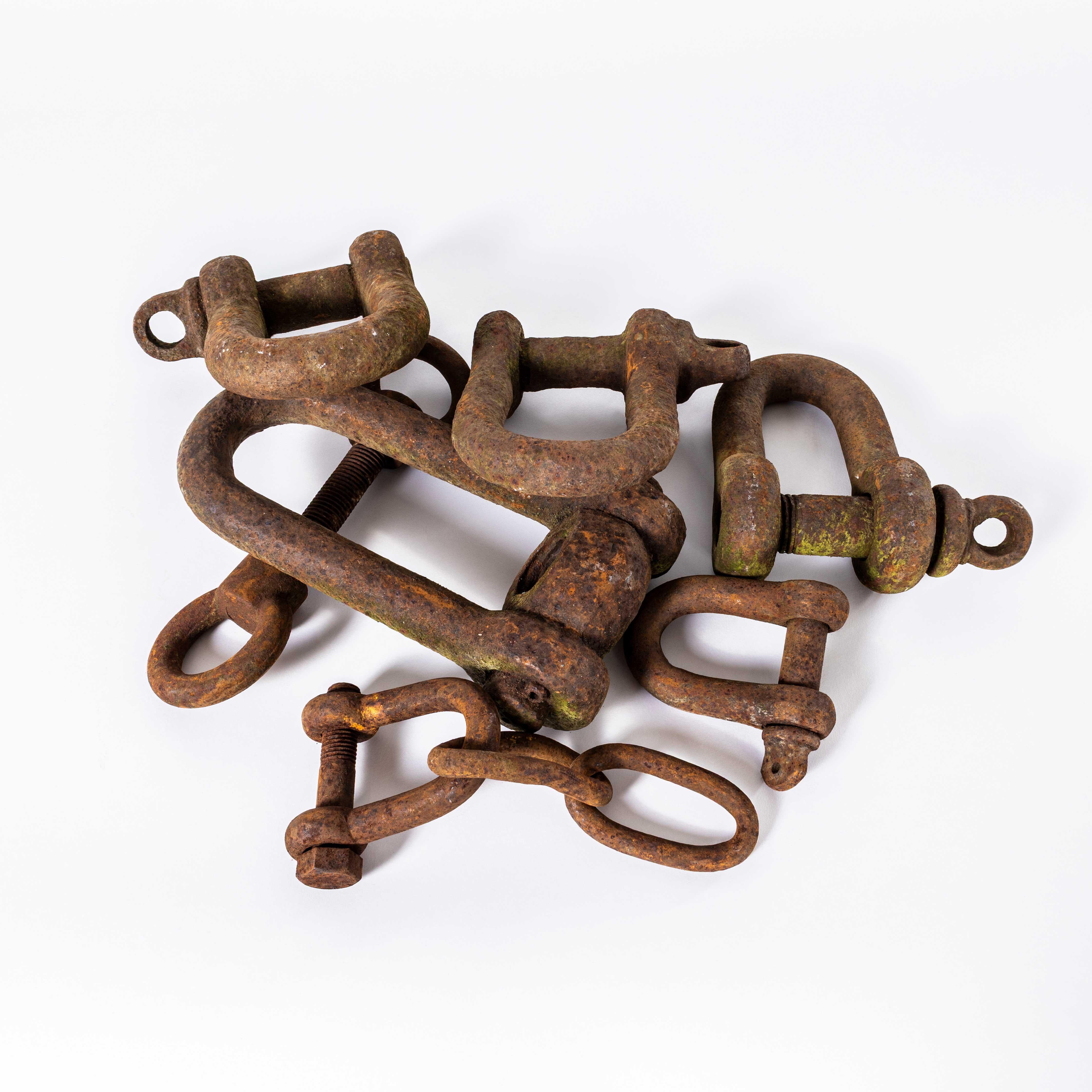 Vintage Collection Of Large Ship Iron Shackles – Set Of Five. 
We came across these hunting for shipping props for a film brief, we didn’t want to carry them but we did. We have left them rusty, brilliant decorative objects.

Workshop Report:
Our