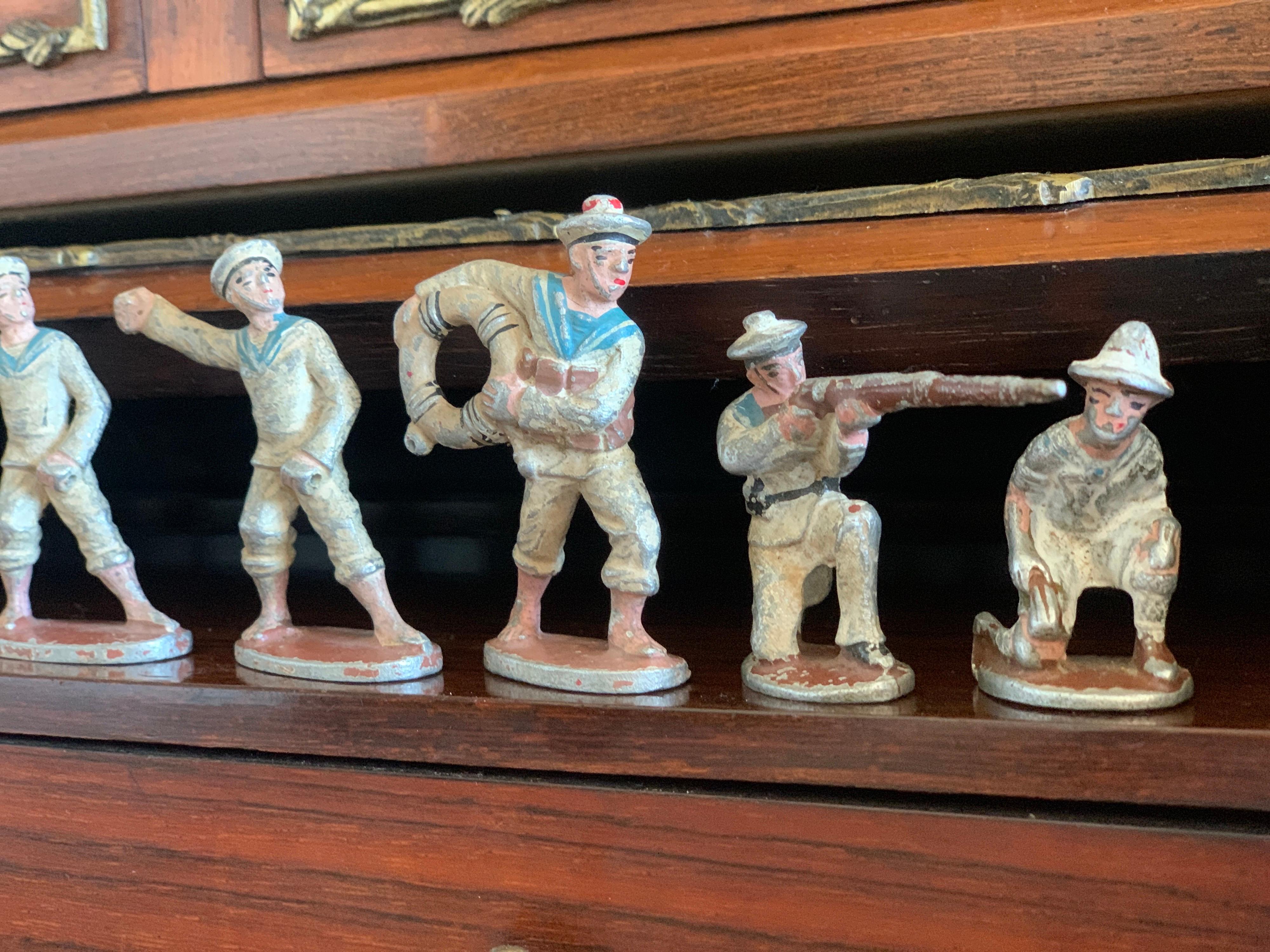 French Vintage Collection of Seven Small Lead Marine Soldiers For Sale