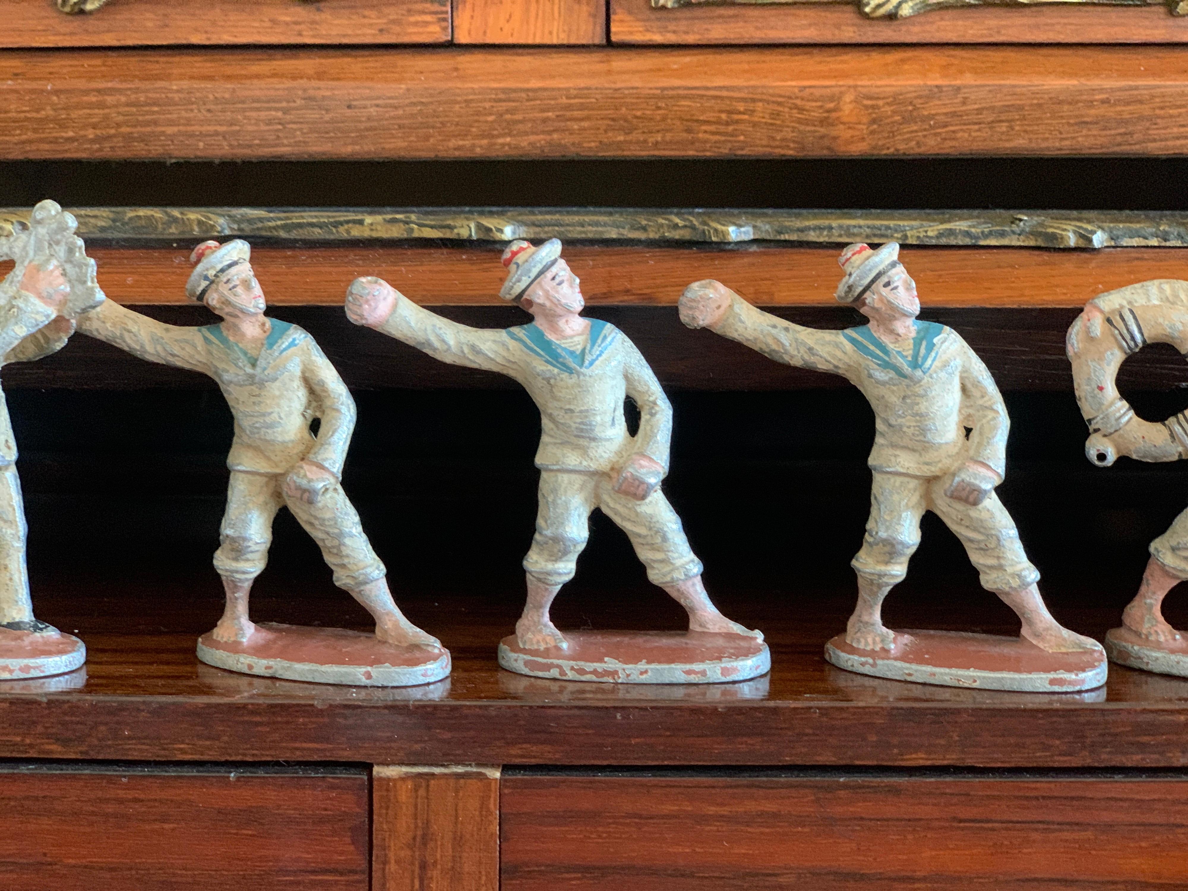 Hand-Painted Vintage Collection of Seven Small Lead Marine Soldiers For Sale