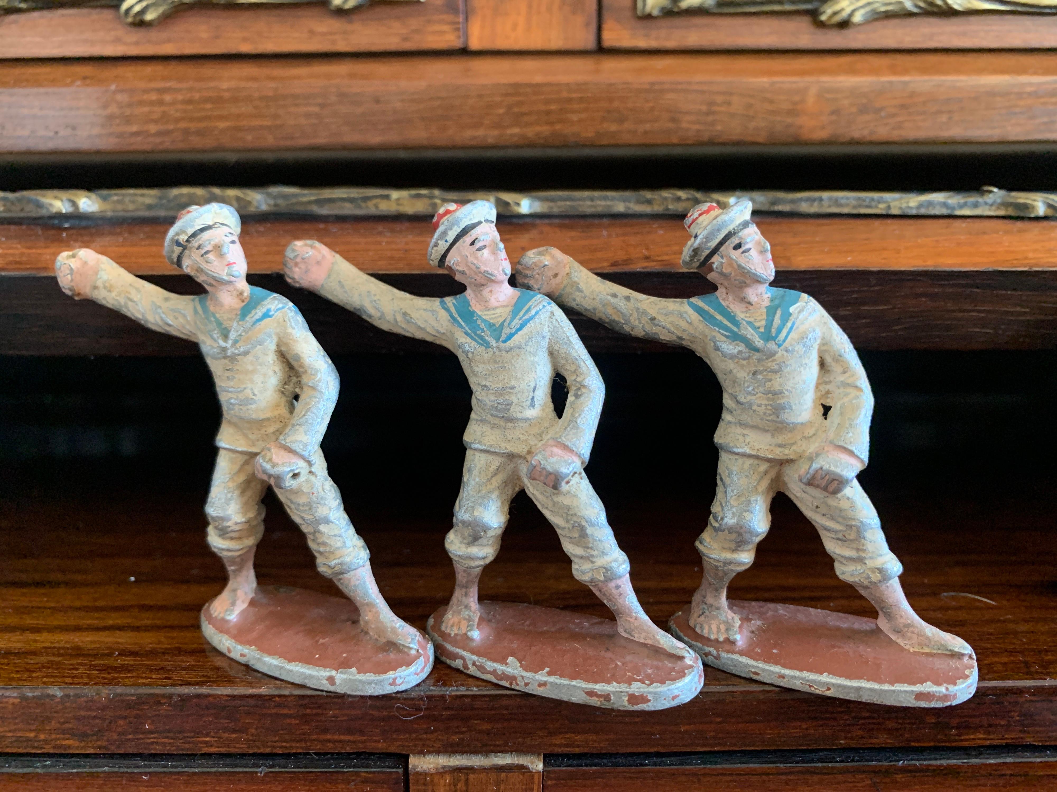 20th Century Vintage Collection of Seven Small Lead Marine Soldiers For Sale
