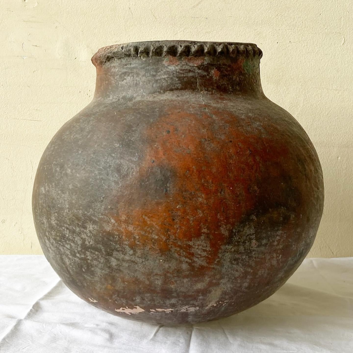 Excellent vintage hand made Colombian water jug /container. Features a spherical shape.
 