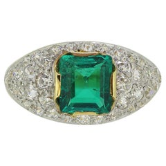 Bague bombée colombienne vintage en émeraude et diamants