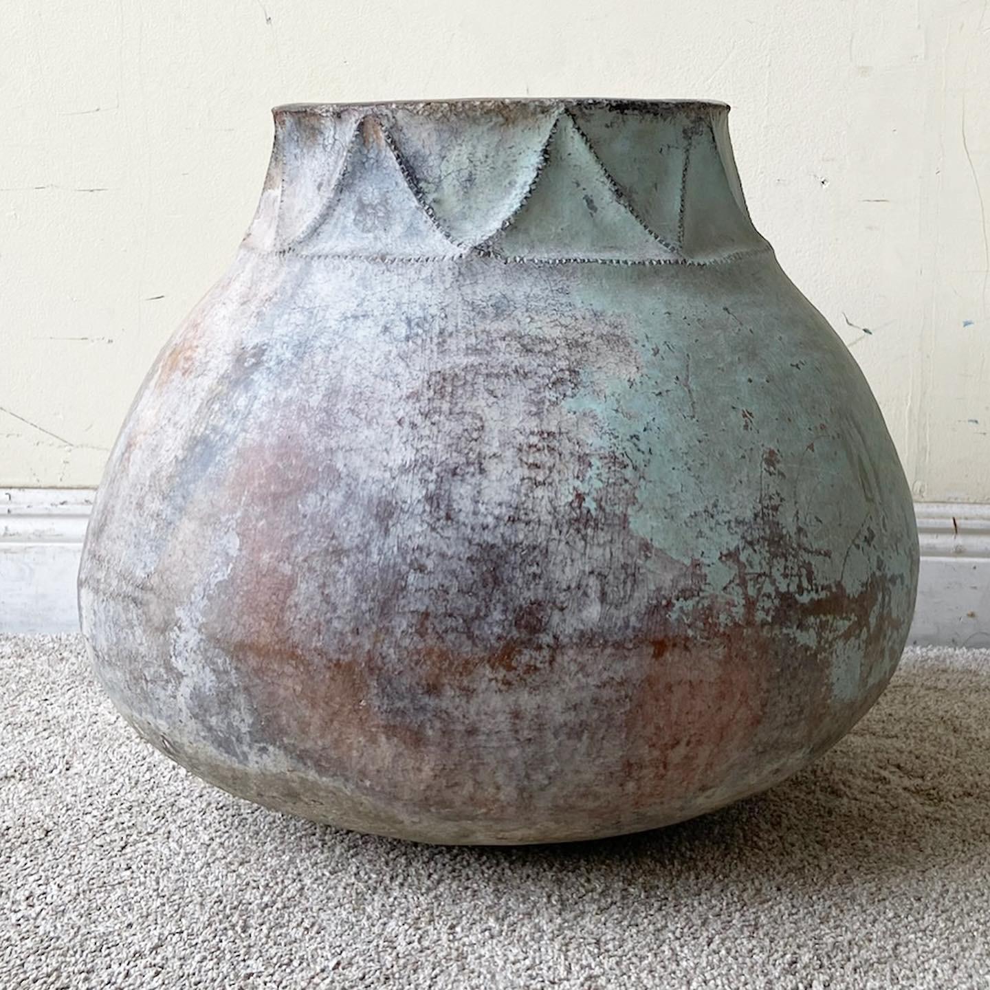 Exceptional large vintage Colombian hand made clay water container / jug. Displays a fantastic native influenced design around the top.
 