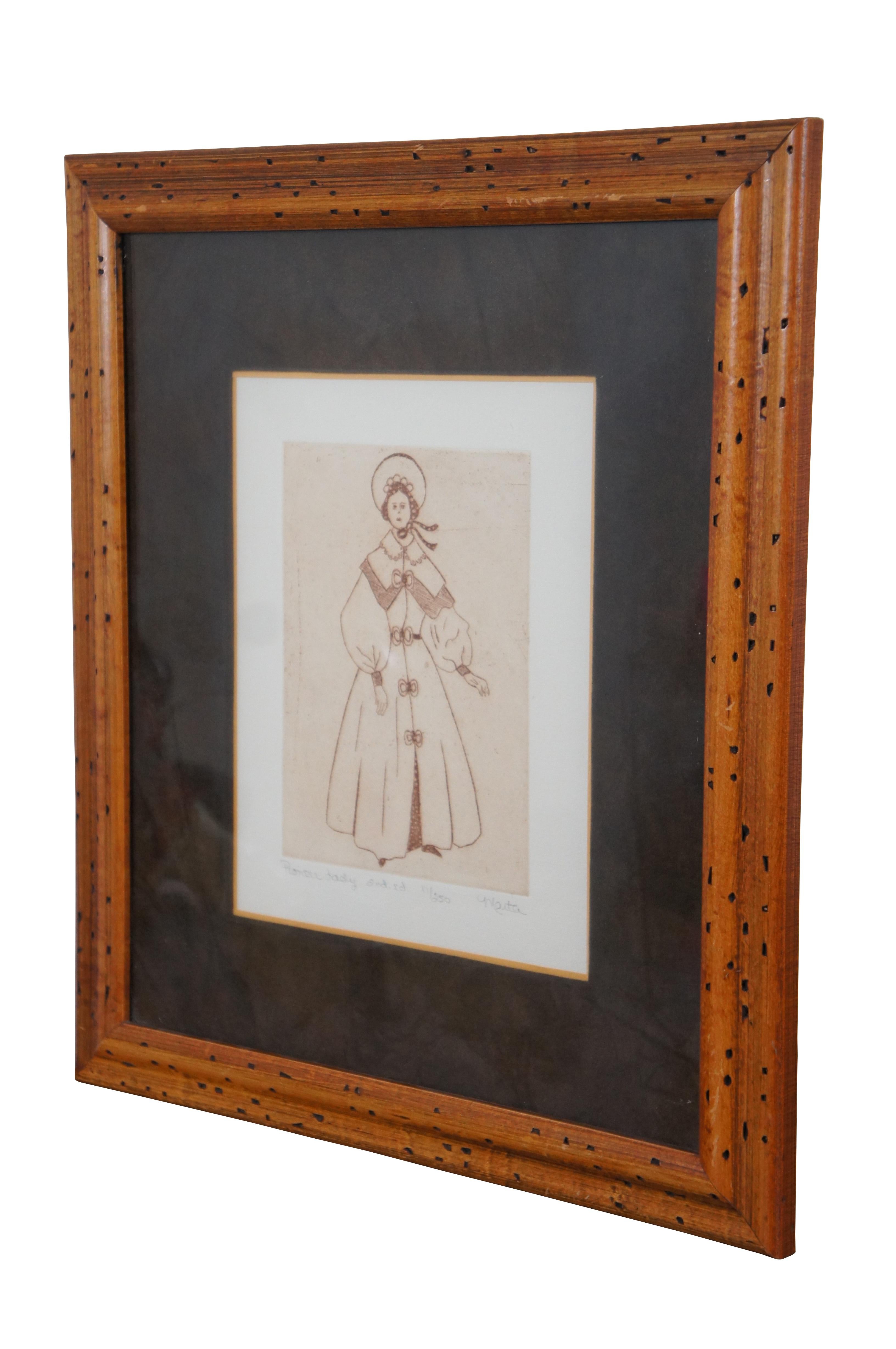 Vintage framed etching titled “Pioneer Lady” 2nd Edition, number 17/250, pencil signed Marta.

Measures: 16.5” x 0.75” x 18.5” / Sans Frame - 8” x 10” (Width x Depth x Height).