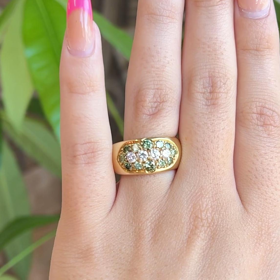 One Vintage Color Treated Green Diamond 18 Karat Yellow Gold Band. Featuring four round brilliant cut diamonds with a total weight of approximately 0.50 carat, graded E color, VS clarity. Accented by 12 round brilliant cut diamonds with a total