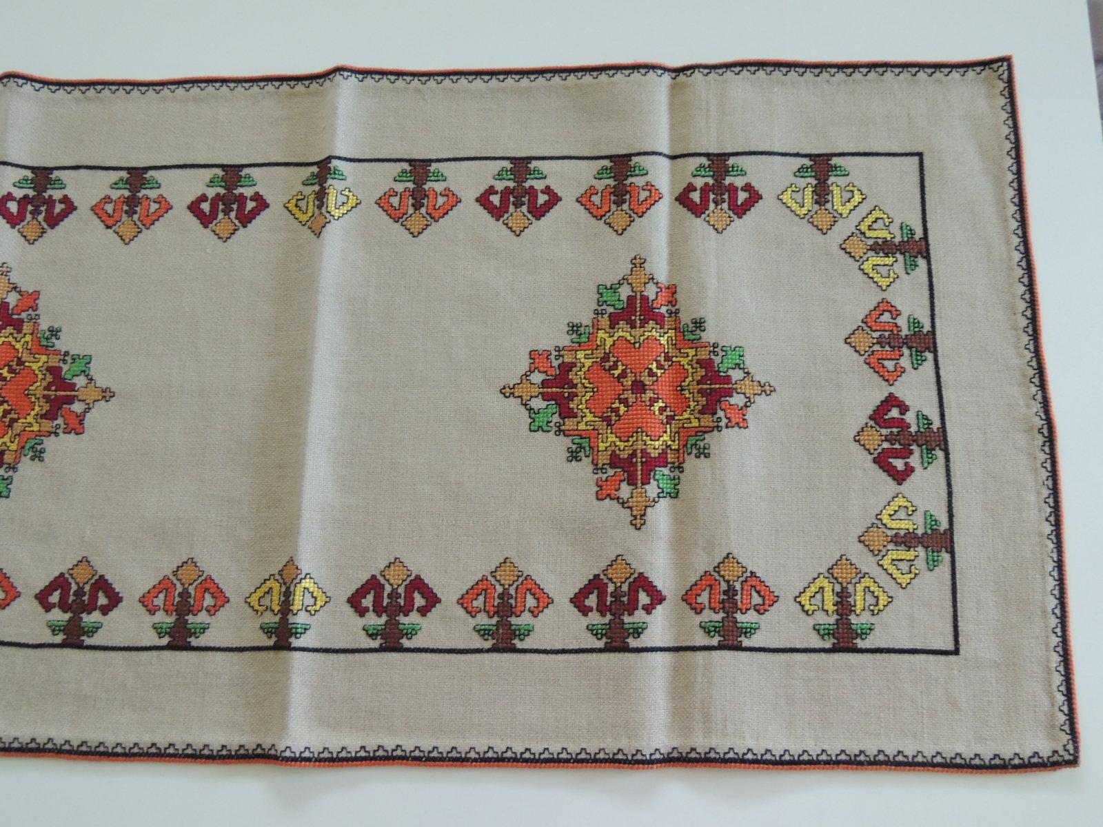 Vintage colorful embroidered table runner textile.
Silk on linen, crossed-stitch in shades of green, orange, black, red, brown and yellow.
Ideal as a curtain valance, pillow or table runner.
Size: 16