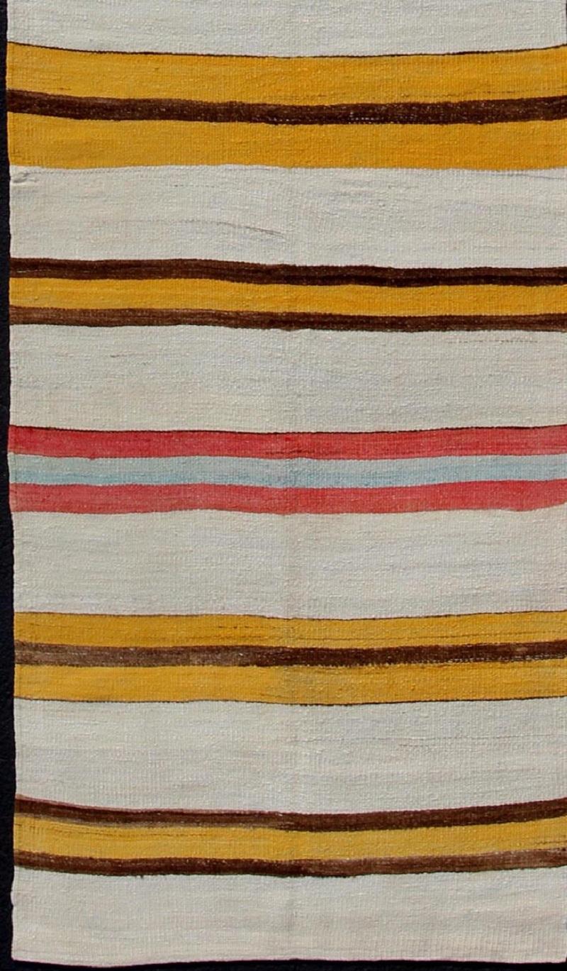 Yellow, Red, Brown, light blue, gray, and Ivory Horizontal Stripe Minimalist Design Flat-Weave Kilim Runner from Turkey, rug en-165309, country of origin / type: Turkey / Kilim, circa 1950.

Featuring a striking stripe design, this unique 1950s