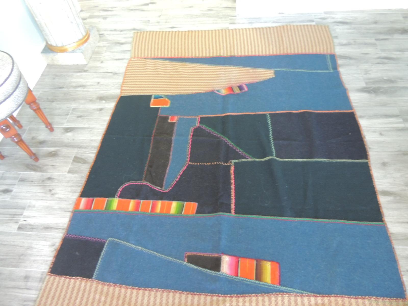Vintage colorful patchwork throw or blanket.
Great tapestry or cloth.
Mixed textiles and wool.
Size: 54