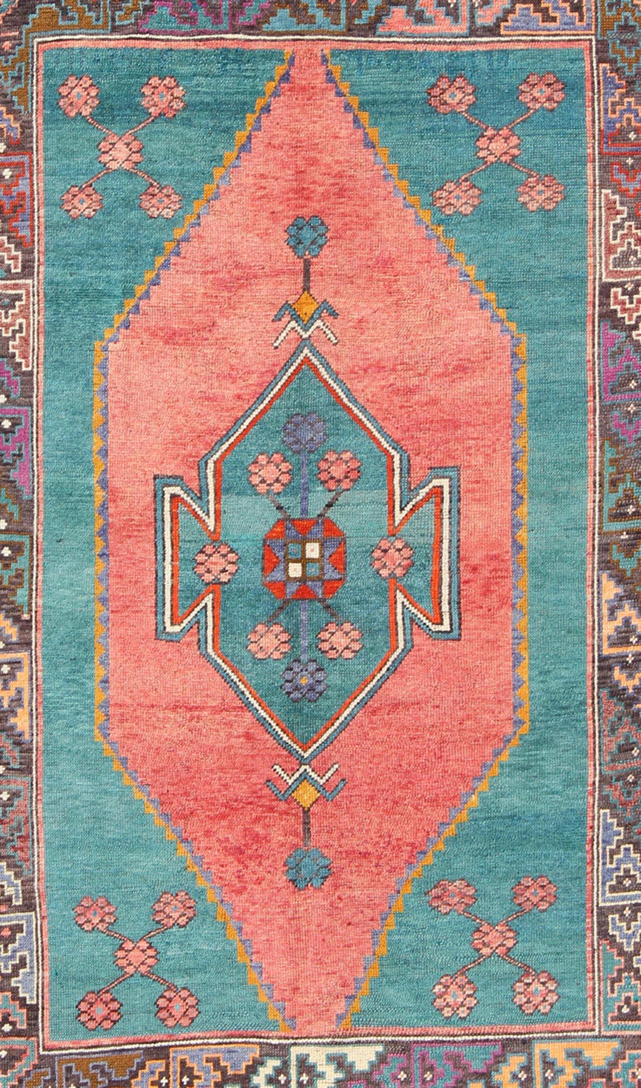 Hand-Knotted Tribal Design Vintage Turkish Rug in Teal, Blue, Green, Charcoal & Coral   For Sale