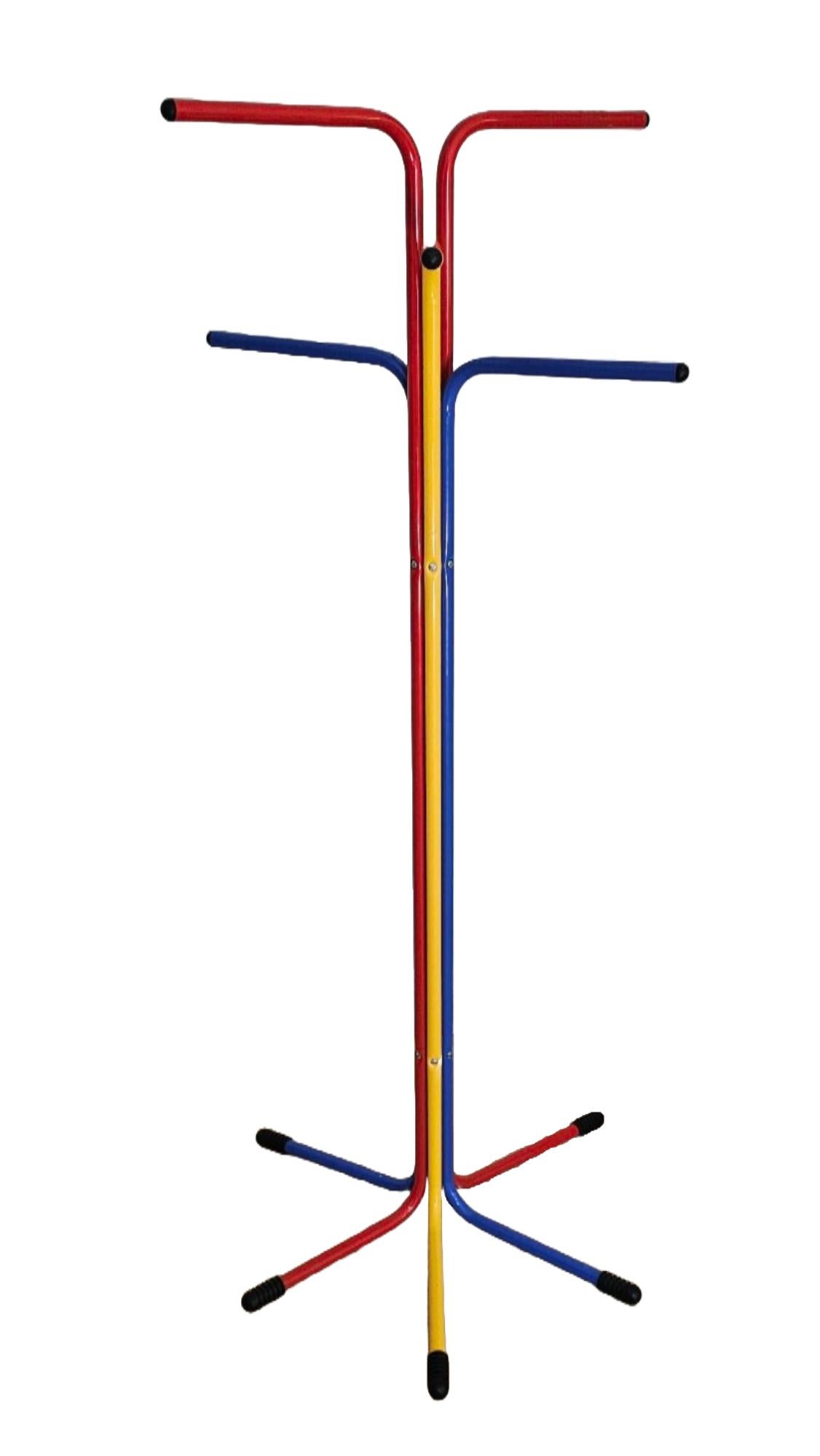 Elevate your space with this exquisite vintage RIGG coat stand, a stunning design by Tord Bjorklund for Ikea from 1987. Showcasing a vibrant palette of primary colors and embodying the bold, postmodern Memphis Milano style, this piece is a true