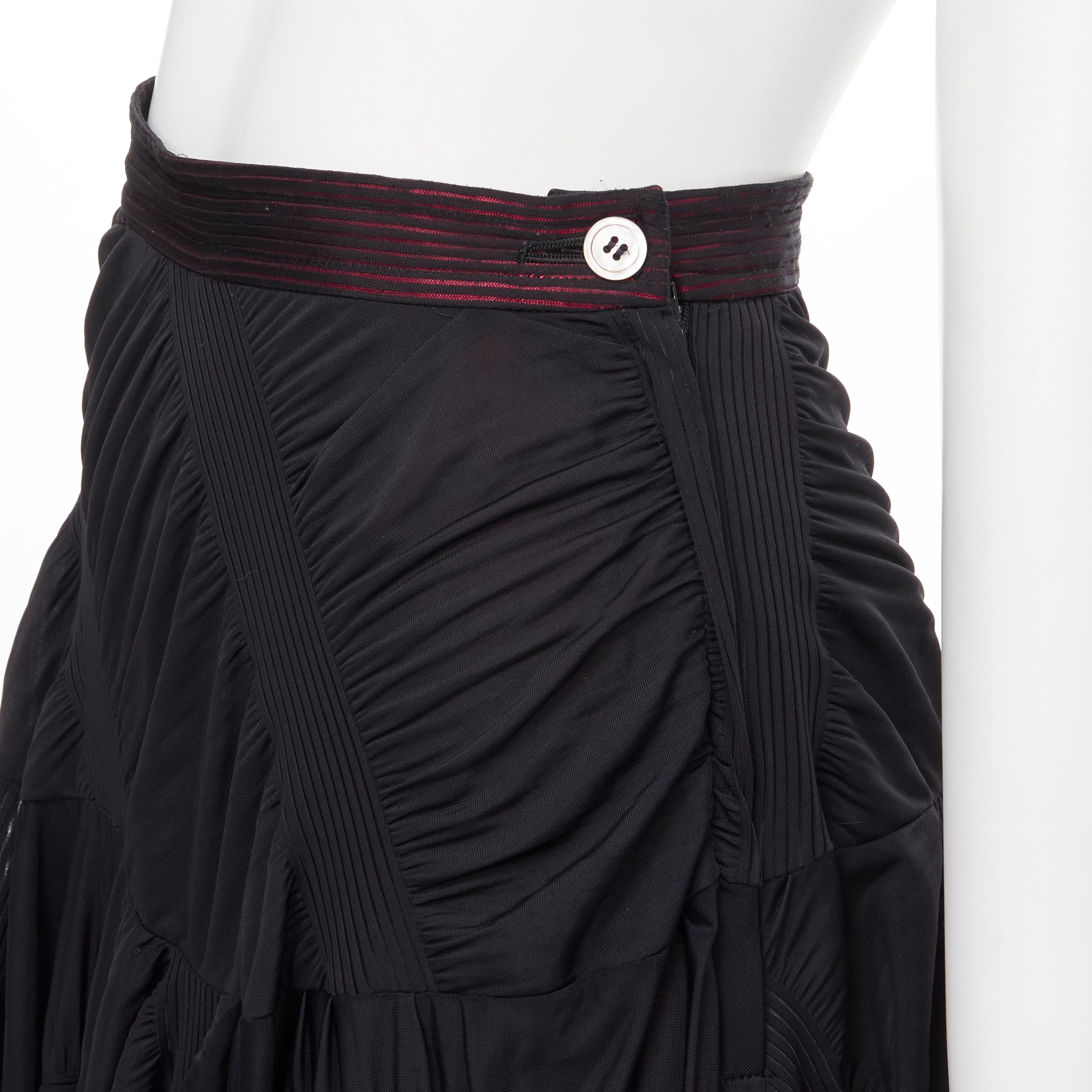 vintage COMME DES GARCONS 1980's black red shirred ruffle layered flared skirt S 
Reference: CRTI/A00433 
Brand: Comme Des Garcons 
Material: Polyester 
Color: Black 
Pattern: Solid 
Closure: Zip 
Made in: Japan 

CONDITION: 
Condition: Excellent,