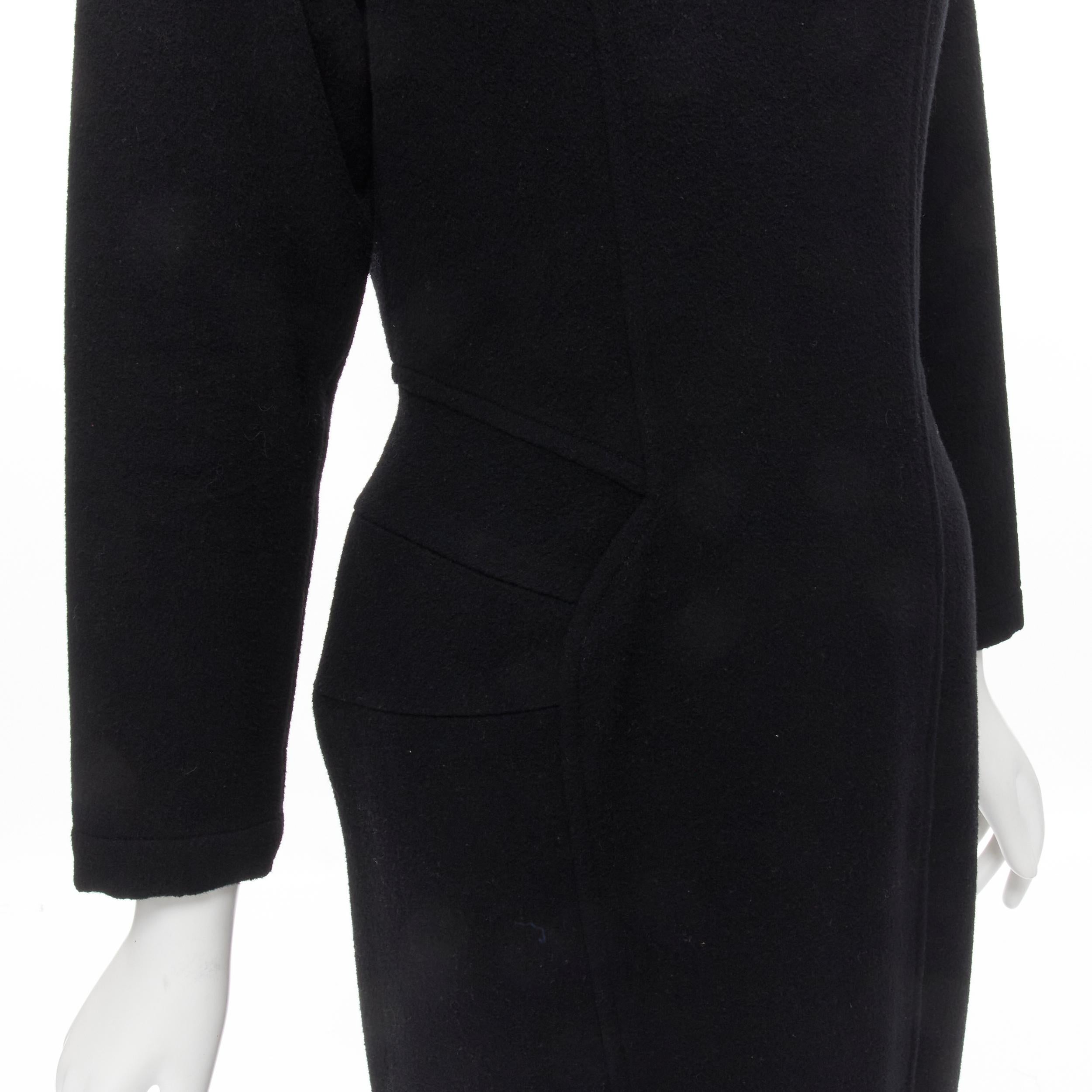 vintage COMME DES GARCONS 1980s black wool asymmetric panelled waist seam sheath dress M 
Reference: CRTI/A00451 
Brand: Comme Des Garcons 
Collection: 1980s 
Material: Wool 
Color: Black 
Pattern: Solid 
Closure: Zip 
Extra Detail: Round neck. Zip