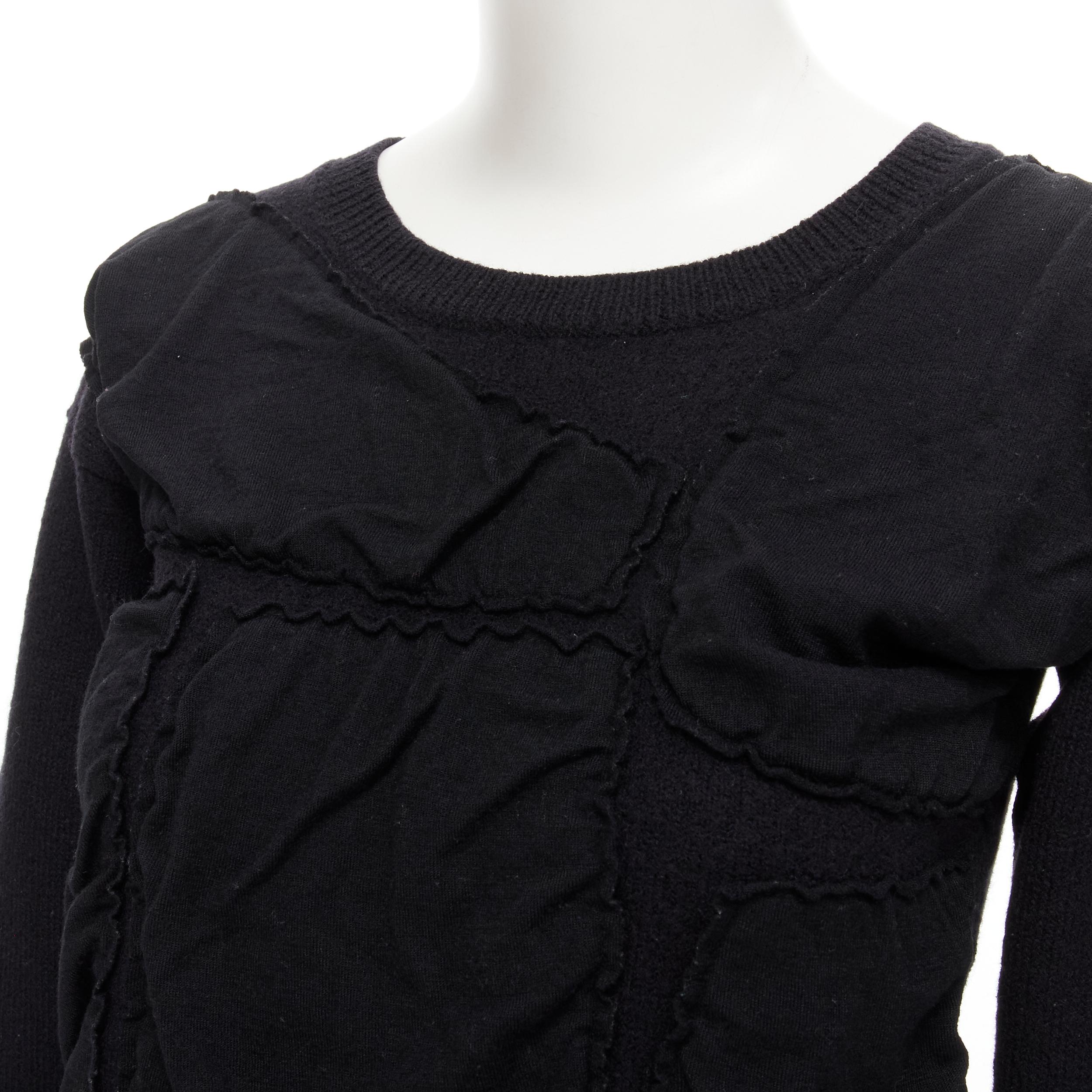 vintage COMME DES GARCONS 1980s bubble patchwork shrunken boiled wool sweater 
Reference: CRTI/A00606 
Brand: Comme Des Garcons 
Designer: Rei Kawakubo 
Collection: 1980's 
Material: Wool 
Color: Black 
Pattern: Solid 
Extra Detail: Bubble patchwork