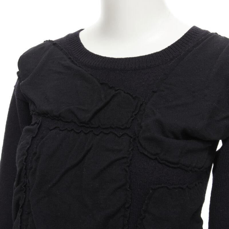 Vintage COMME DES GARCONS Blasen Patchwork-Pullover aus geschmolzener Wolle, 1980er Jahre
Referenz: CRTI/A00606
Marke: Comme Des Garcons
Designer: Rei Kawakubo
Collection'S: 1980s
MATERIAL: Wolle
Farbe: Schwarz
Muster: Solide
Zusätzliche Details: