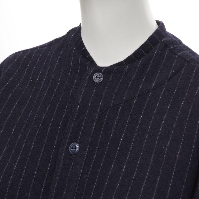 vintage COMME DES GARCONS 1980s navy blue pinstripe wool boxy baseball shirt S
Reference: CRTI/A00391
Brand: Comme Des Garcons
Designer: Rei Kawakubo
Collection: 1980s
Material: Wool
Color: Blue
Pattern: Striped
Closure: Button
Extra Details:
