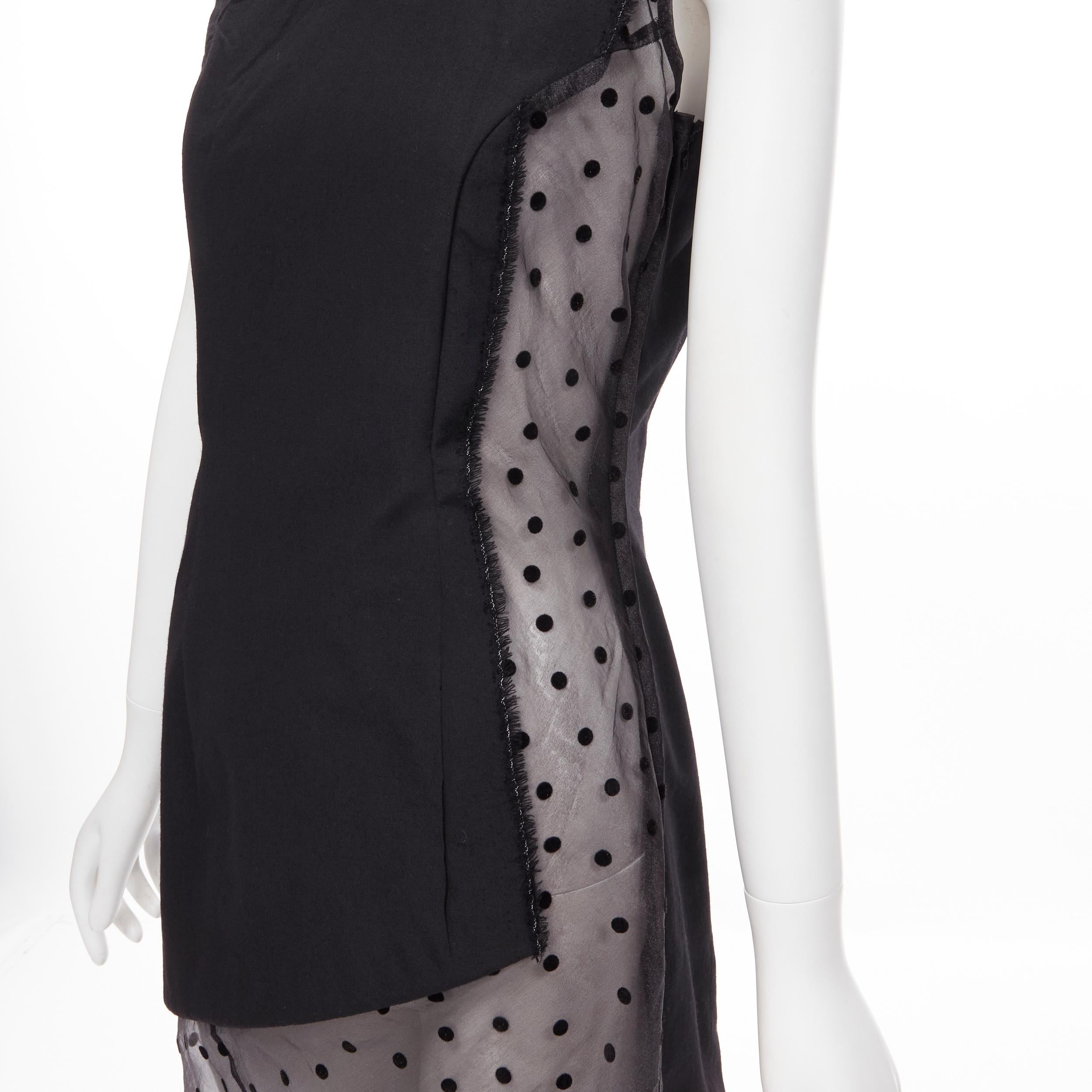 vintage COMME DES GARCONS 1997 black sheer polka dot panel asymmetric dress M 
Reference: CRTI/A00403 
Brand: Comme Des Garcons 
Collection: 1997 Runway 
Material: Wool 
Color: Black 
Pattern: Polka Dot 
Closure: Zip 
Extra Detail: Faux layered.